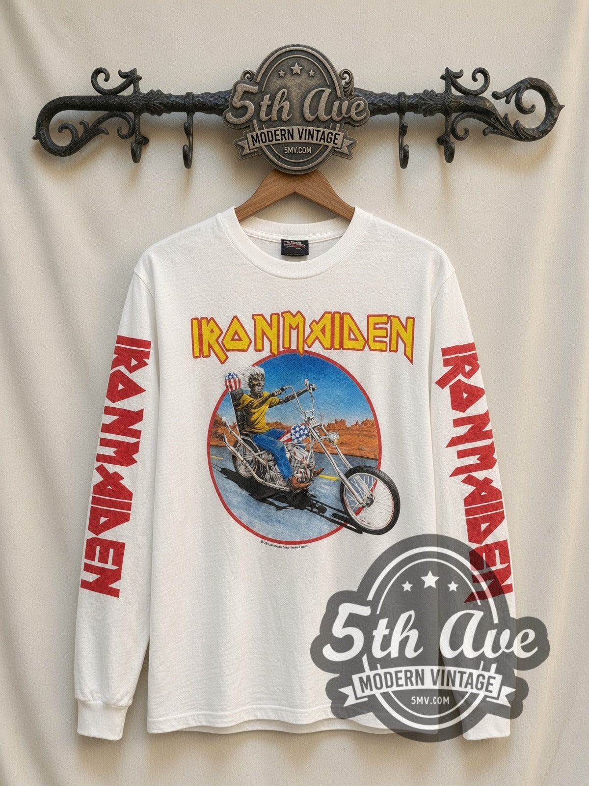 Iron Maiden Eddie Motorcycle vintage band long sleeve t-shirt in white, front view on a display rack