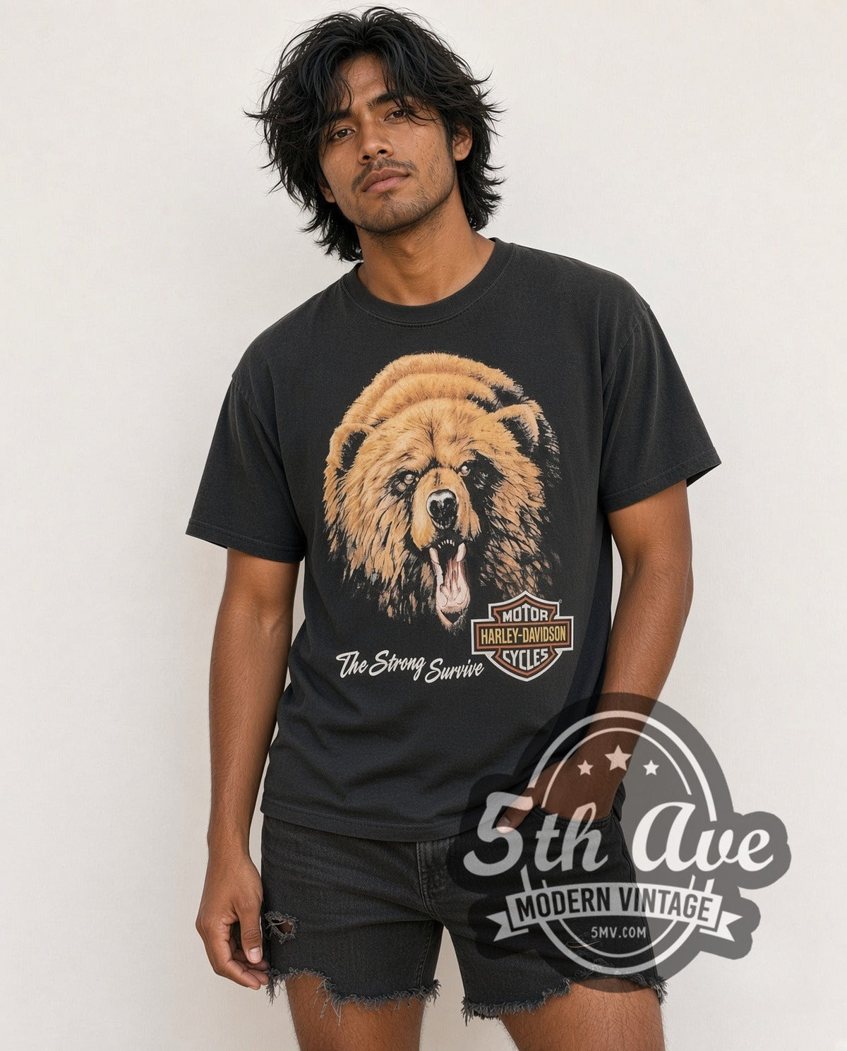 Model wearing the Harley-Davidson The Strong Survive Lake Shore, Waukegan, IL vintage Harley tee in black