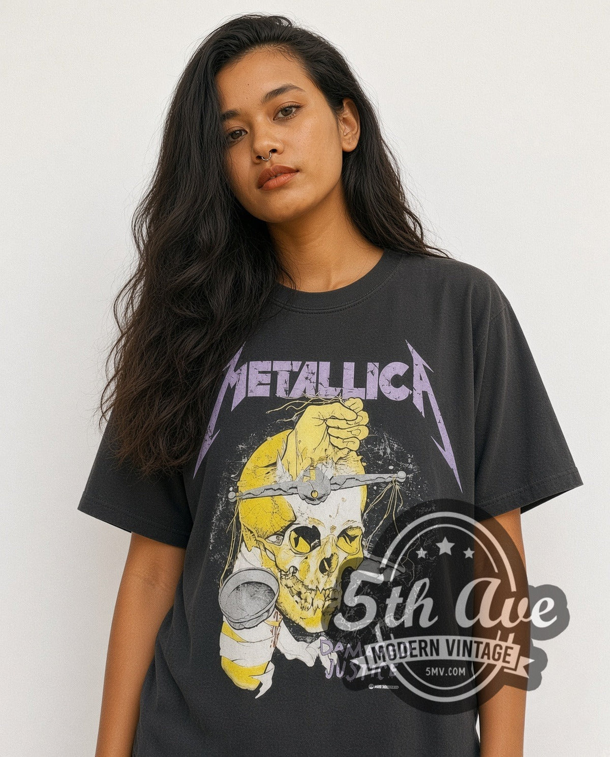 Model wearing the Metallica Damaged Justice Hammer of Justice Crushes You vintage band t-shirt in black
