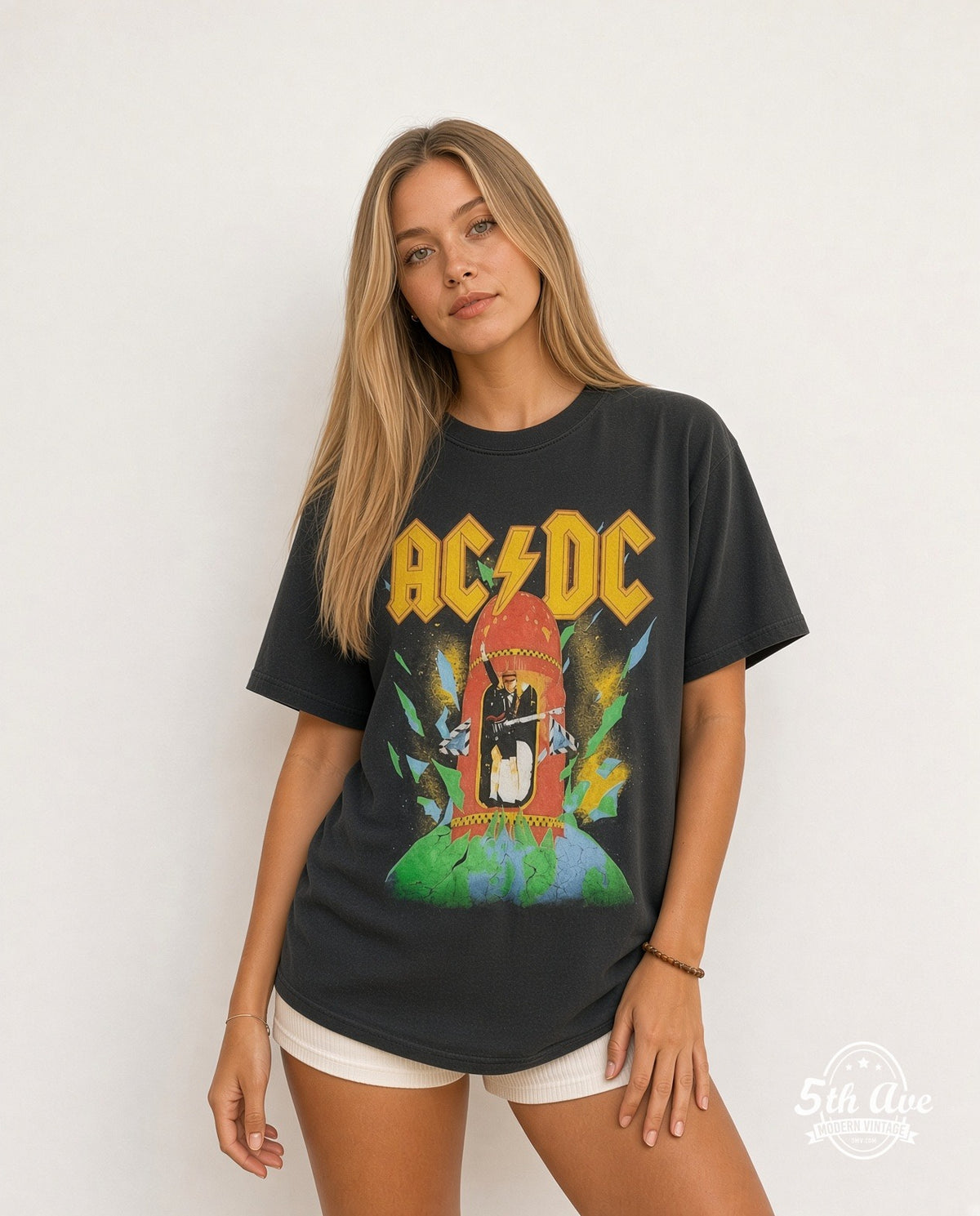Model wearing the AC/DC Blow Up Your Video Red Rocket Blimp vintage band t-shirt in black