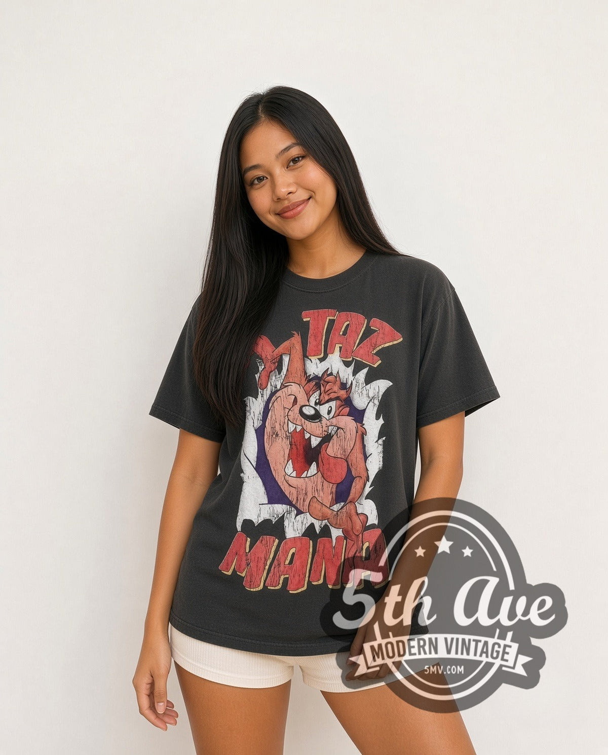 Model wearing the Looney Tunes Taz-Mania Back Off vintage cartoon tee in black