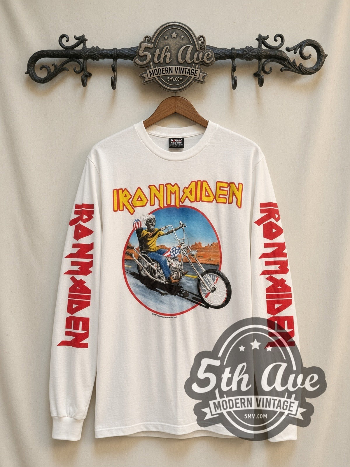 Iron Maiden Eddie Motorcycle vintage band long sleeve t-shirt in white, front view on a display rack