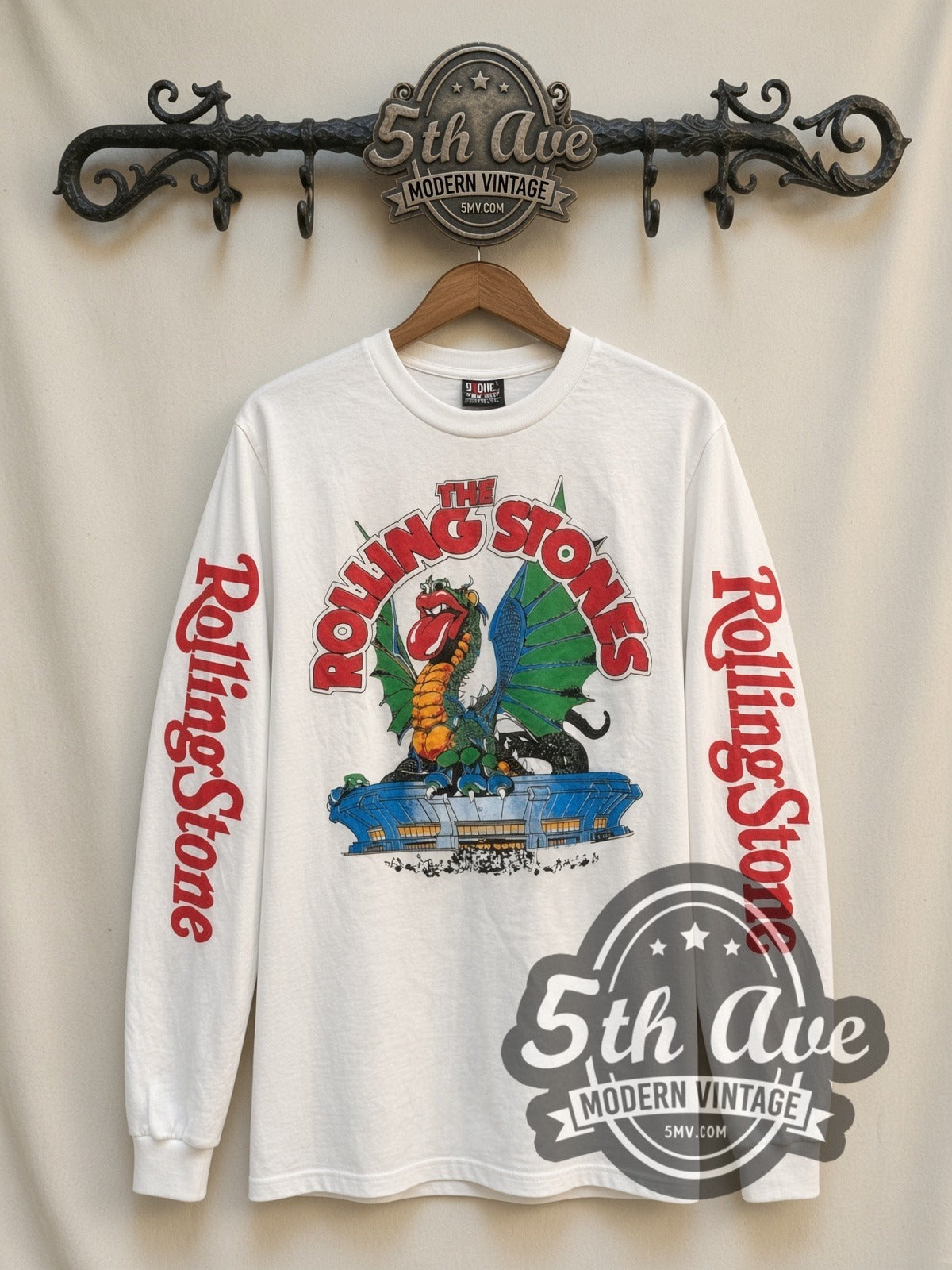 The Rolling Stones Dragon vintage band long sleeve t-shirt, front view on a display rack
