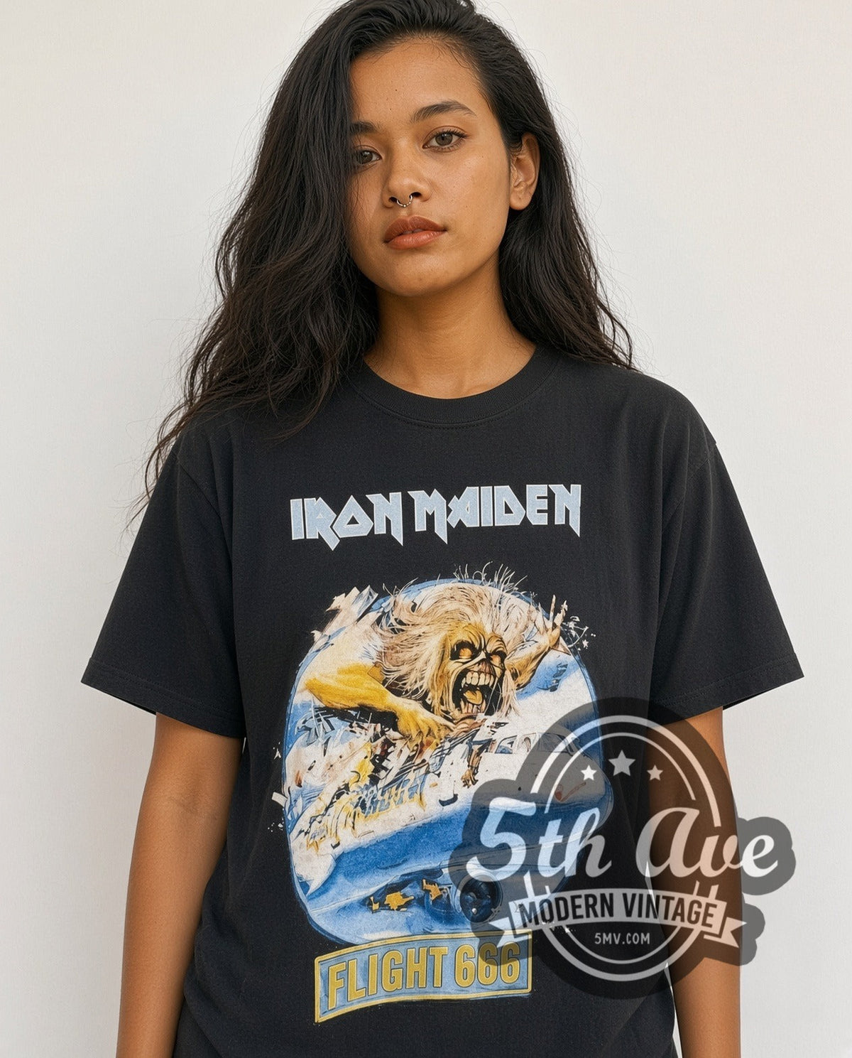 Model wearing the Iron Maiden Flight 666 vintage band t-shirt in black