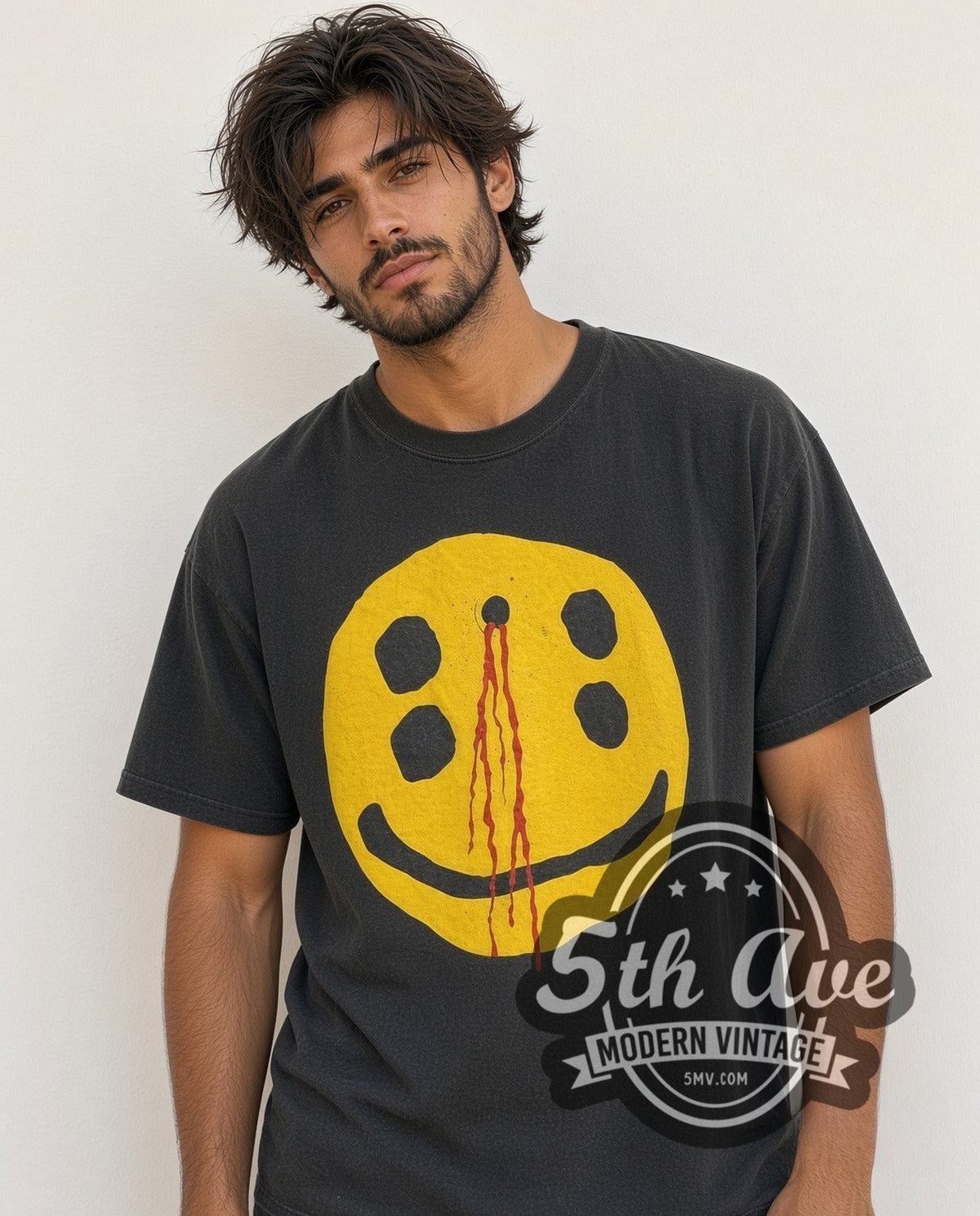 Model wearing the Cactus Plant Flea Market Headshot vintage graphic tee in black