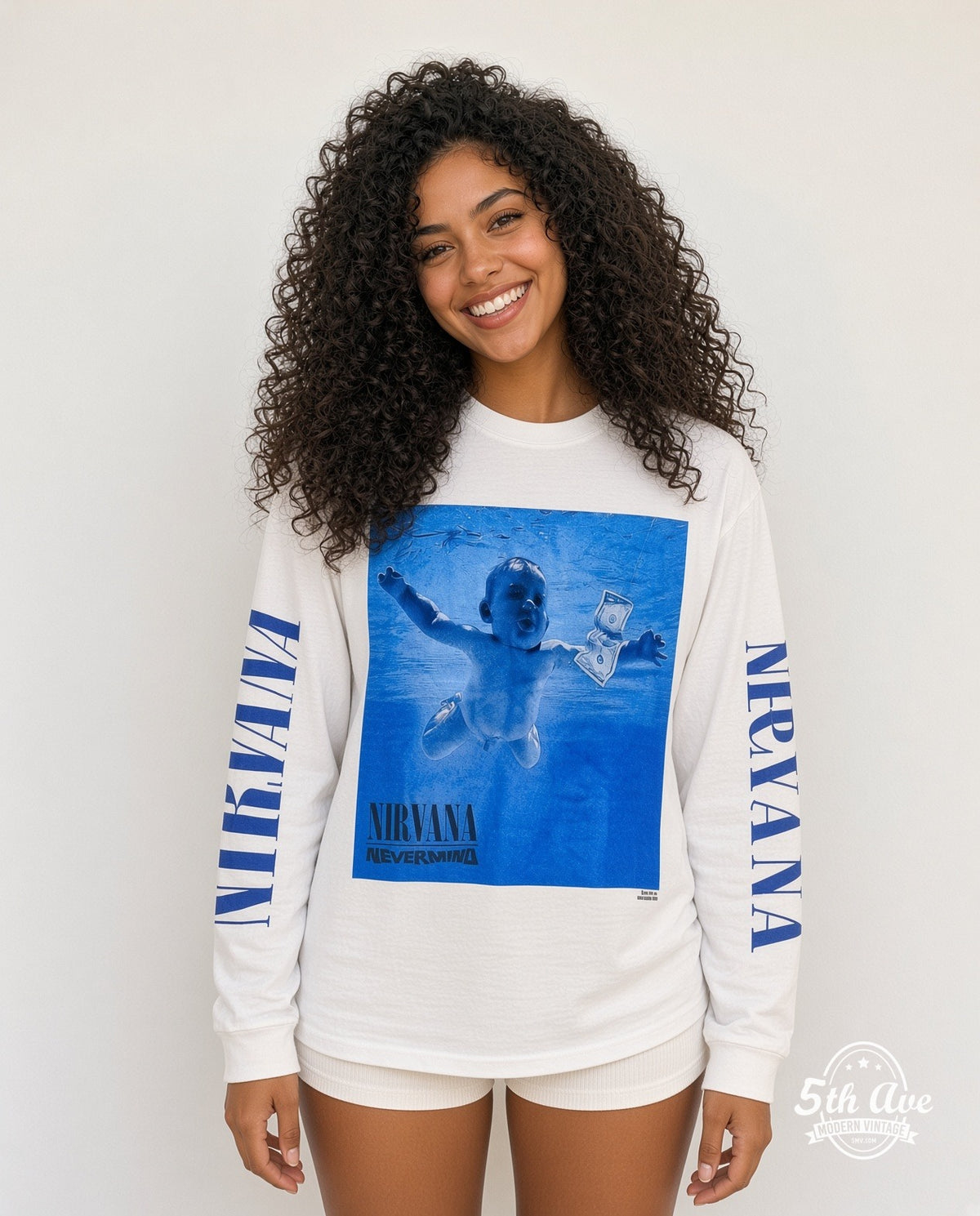 Model wearing the Nirvana Nevermind Baby Cover Tracklist Long Sleeve vintage band t-shirt in white