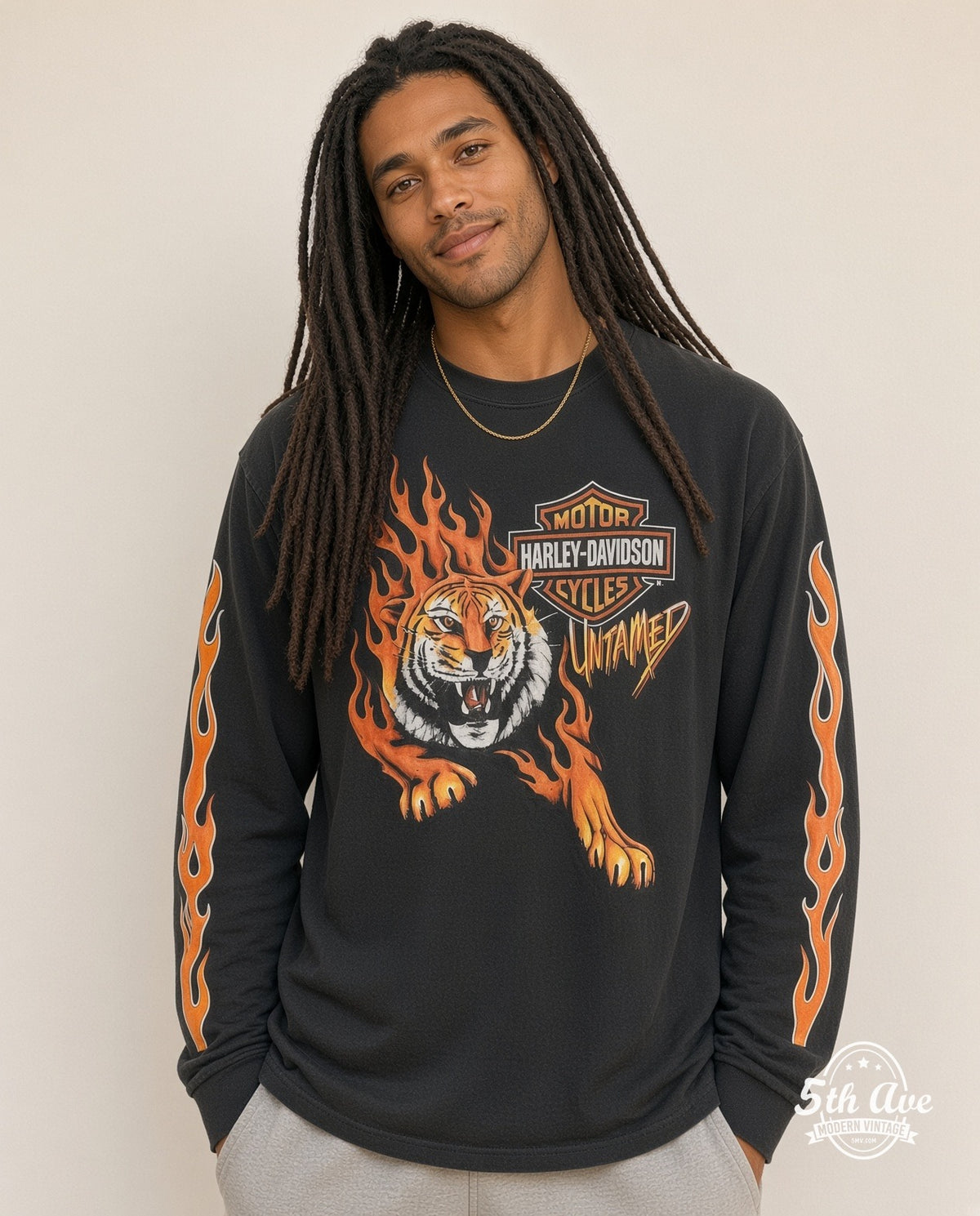 Model wearing the Harley Davidson 'Untamed' graphic tee in black