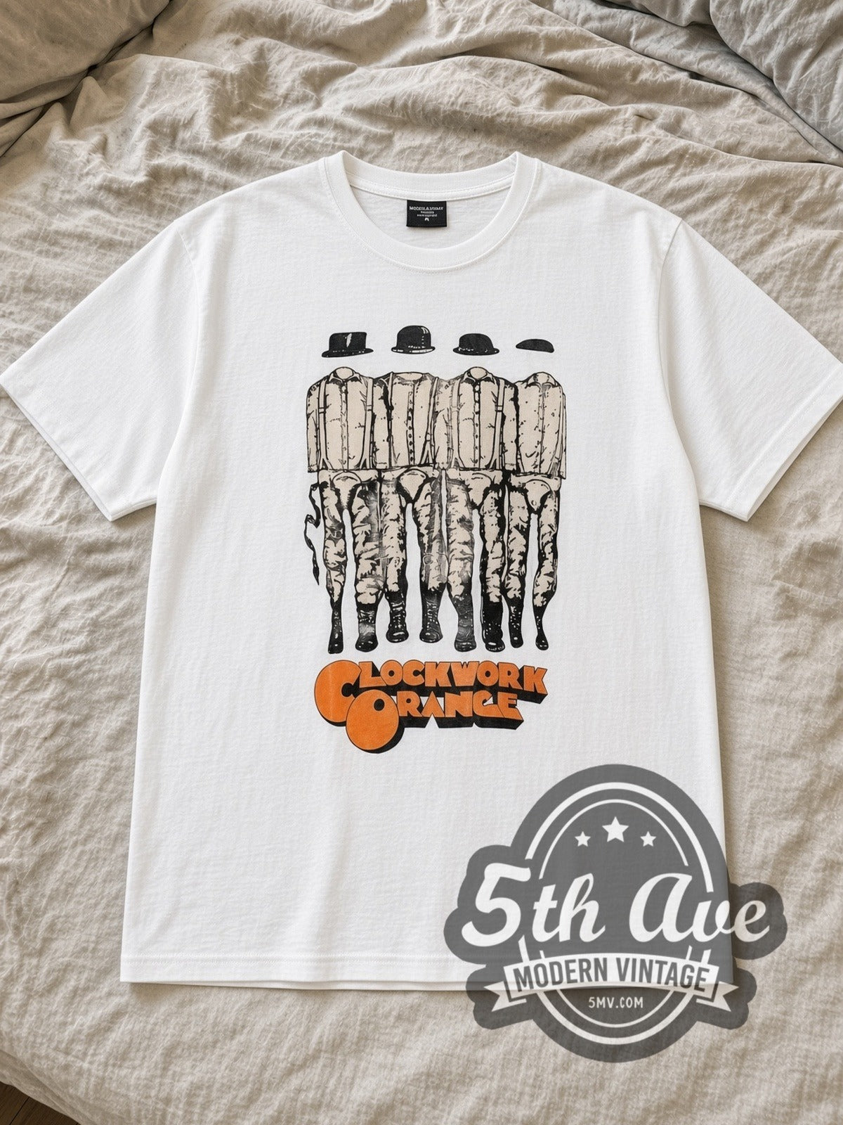 White A Clockwork Orange Droogs Lineup Vintage Movie T-Shirt laid flat on a linen bed