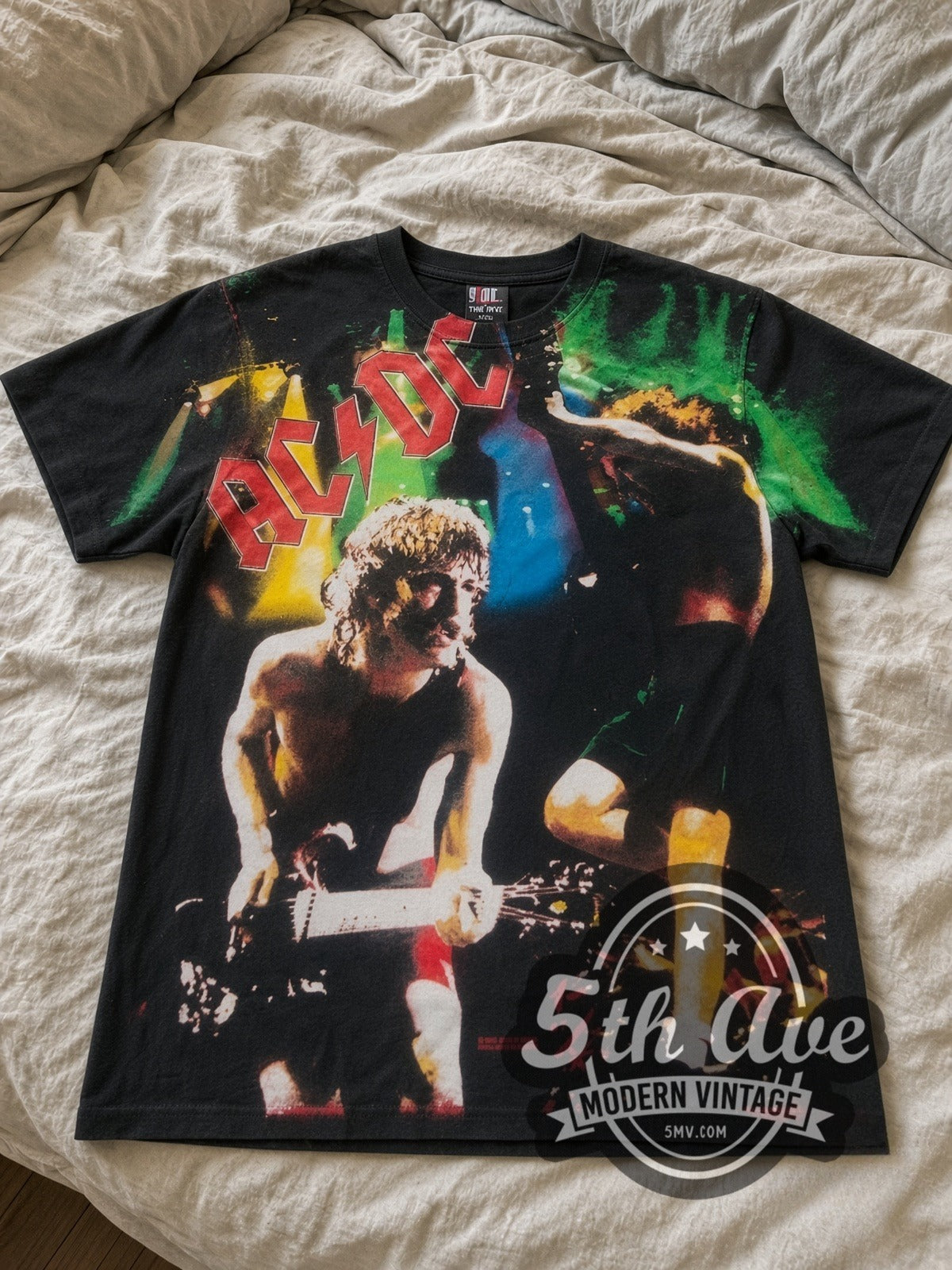 AC/DC Angus Concert Stage all-over-print vintage band tee laid flat