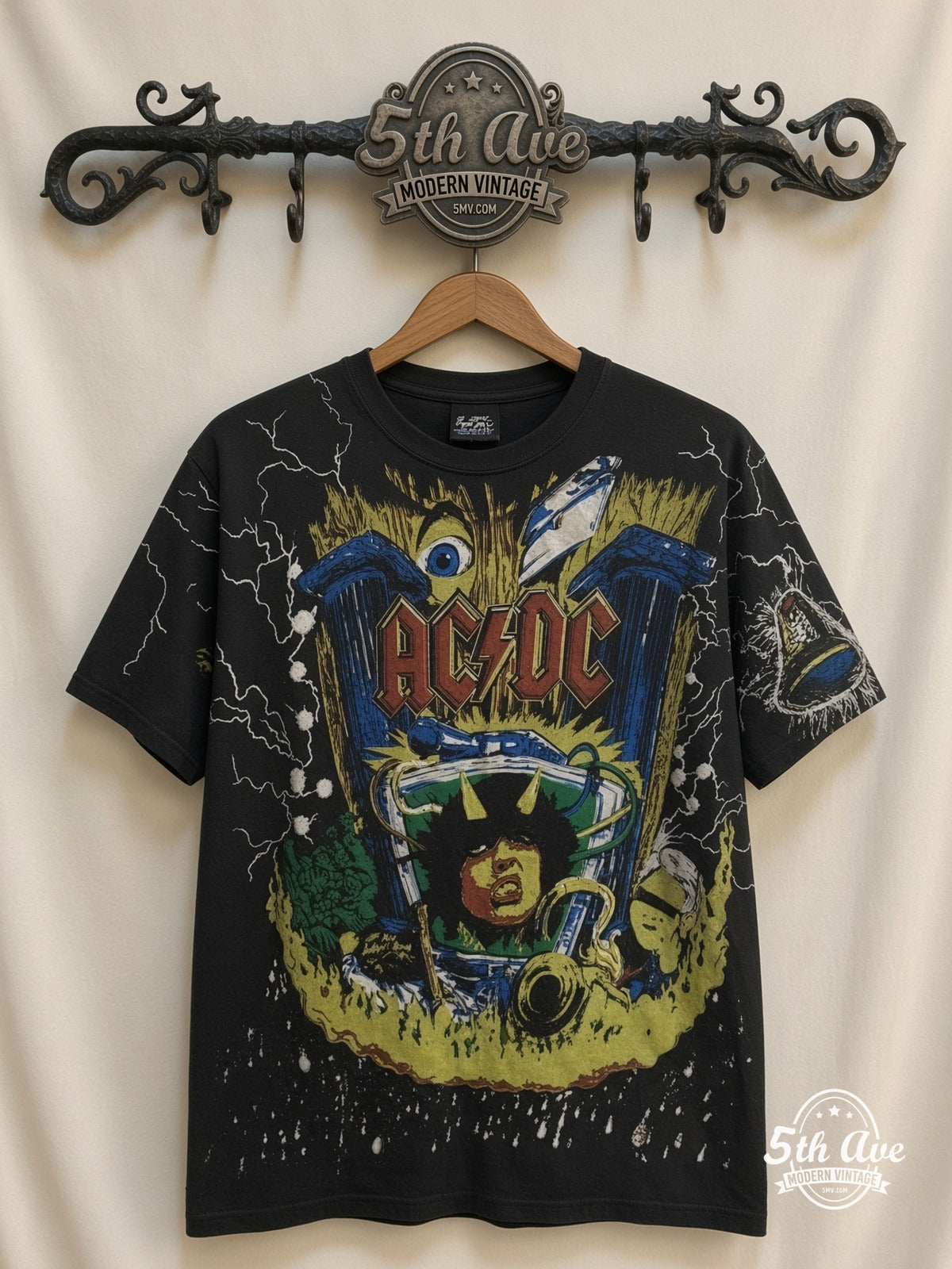 AC/DC Angus V Graphic Black all over print vintage band t-shirt front on cream 5th Ave rack