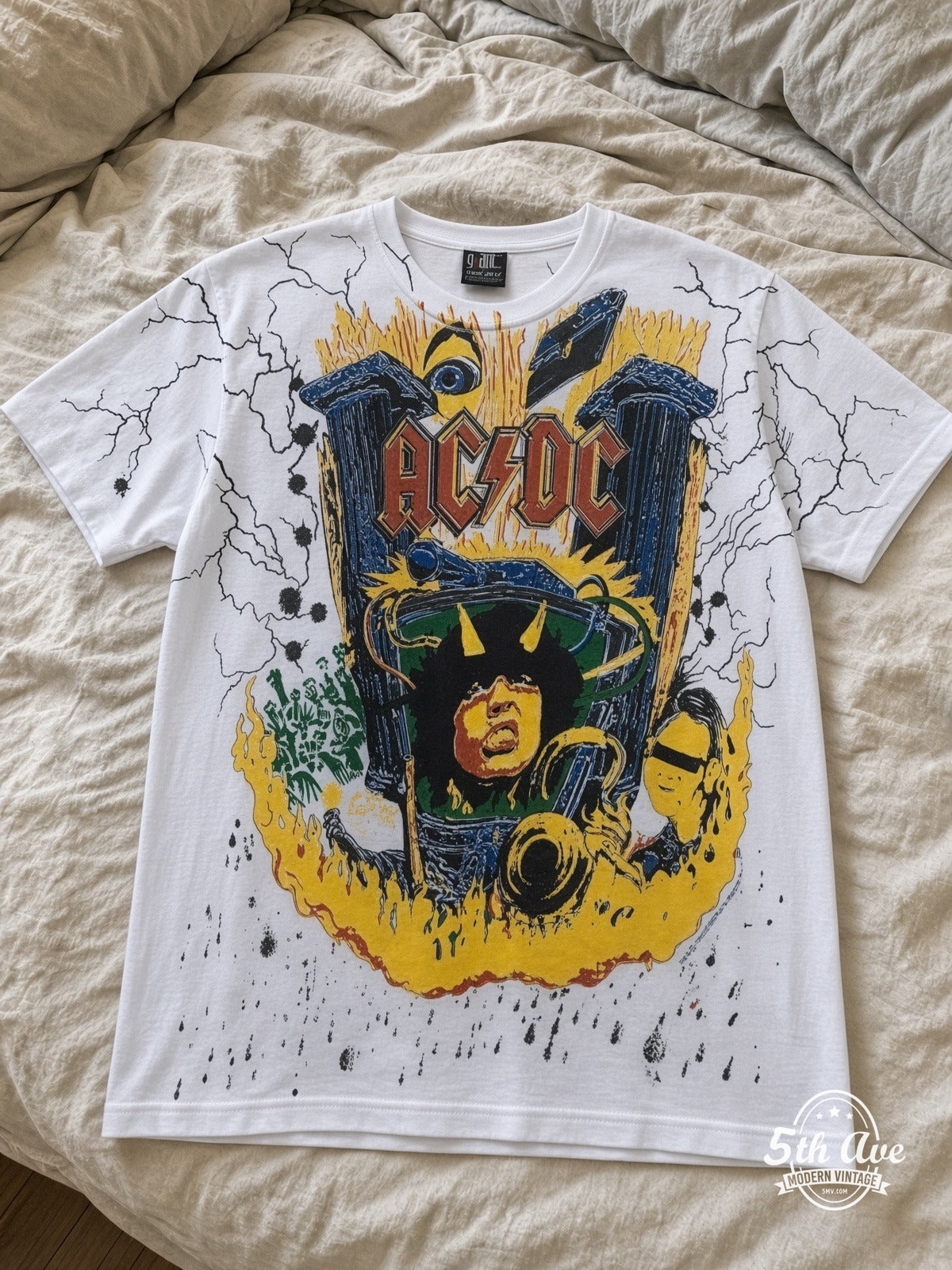 AC/DC Angus V Graphic all over print vintage tee laid on bed