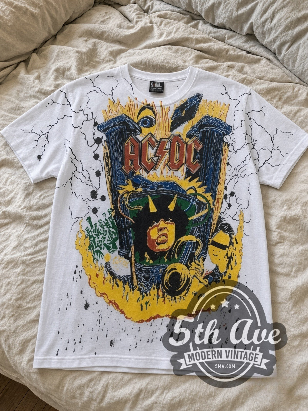 AC/DC Angus V all-over-print vintage band tee laid flat
