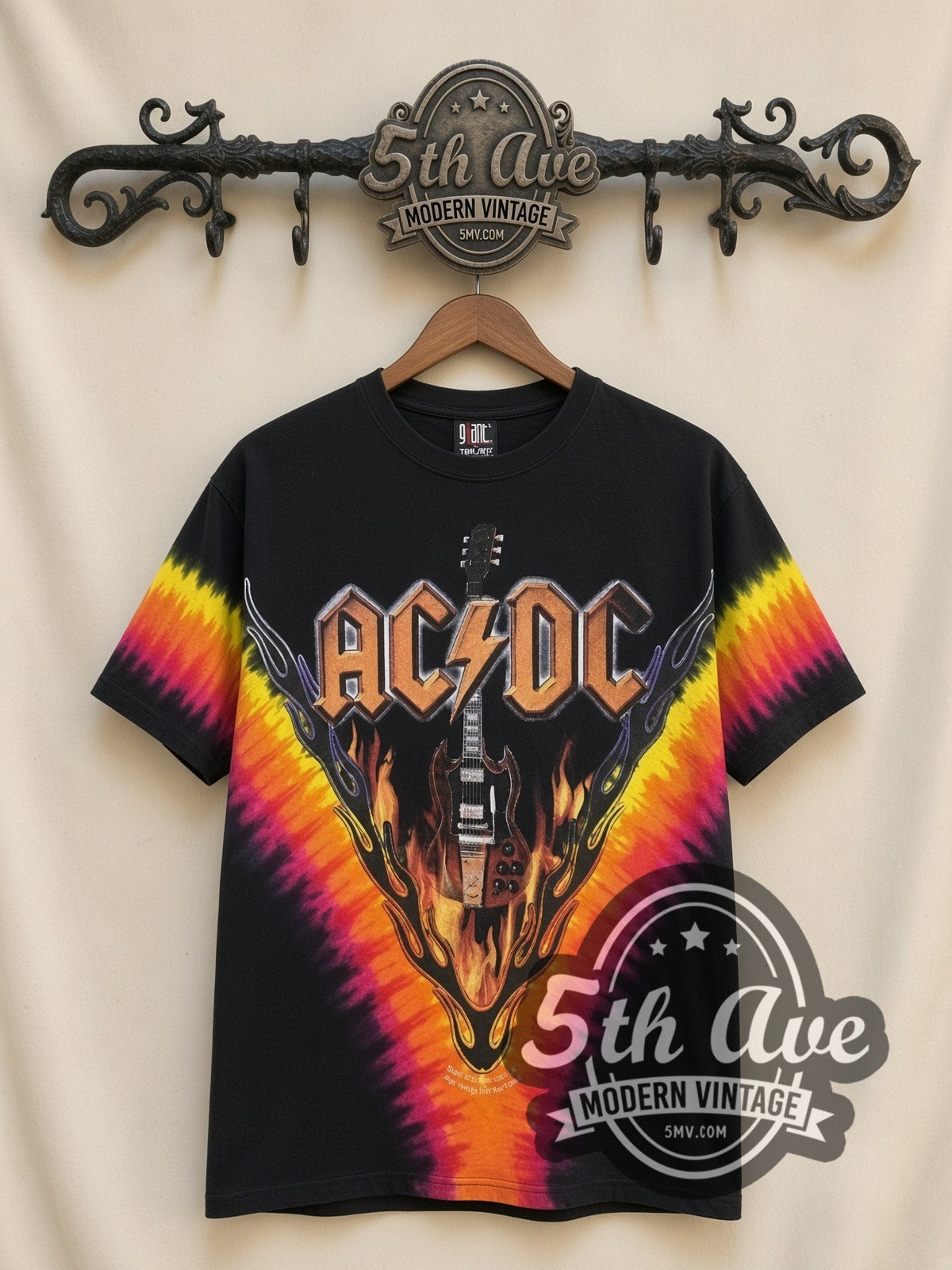 AC/DC Flaming Winged Guitar Tie-Dye V all-over-print vintage band t-shirt in black, front view on the 5MV rack