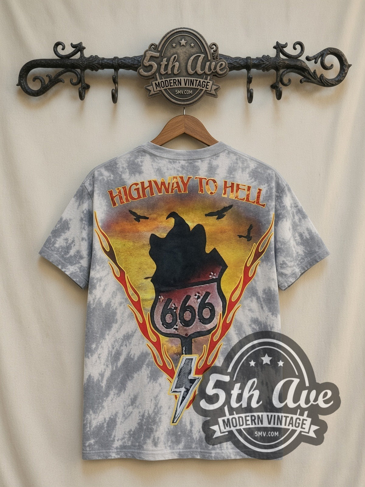 AC/DC Highway to Hell Tie-Dye V Grey all-over-print vintage band t-shirt, back view on a display rack