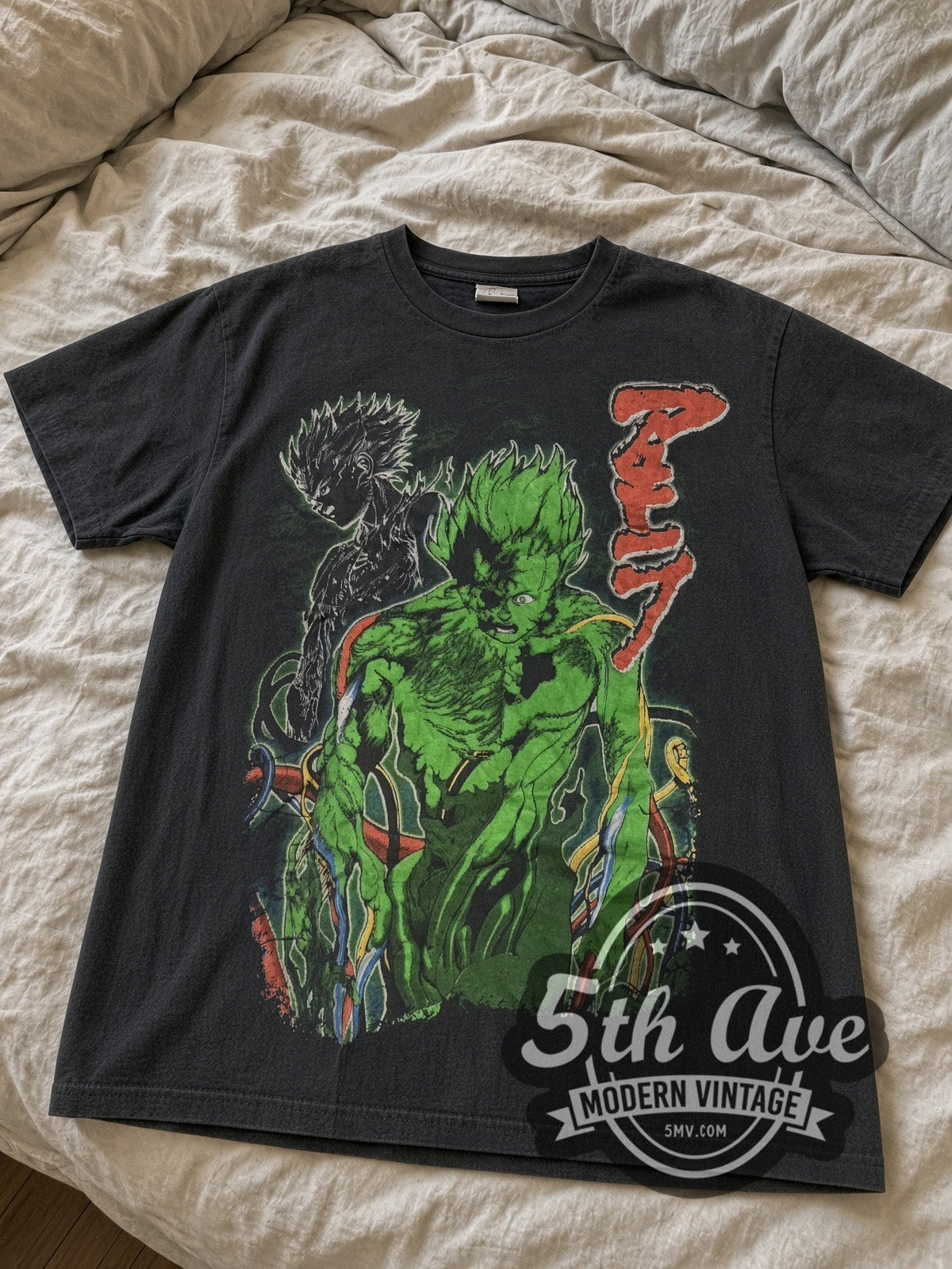 Akira Green Mutated Tetsuo vintage anime tee laid flat