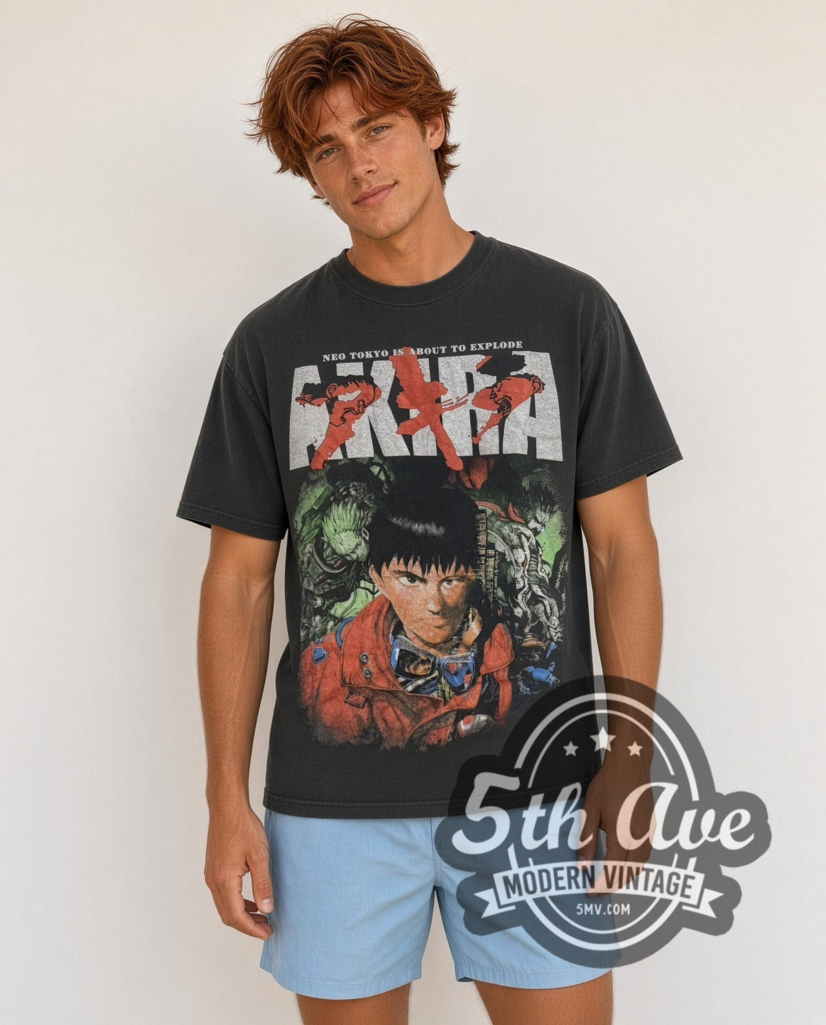 Model wearing the Akira Kaneda Neo Tokyo Is About To Explode vintage anime t-shirt