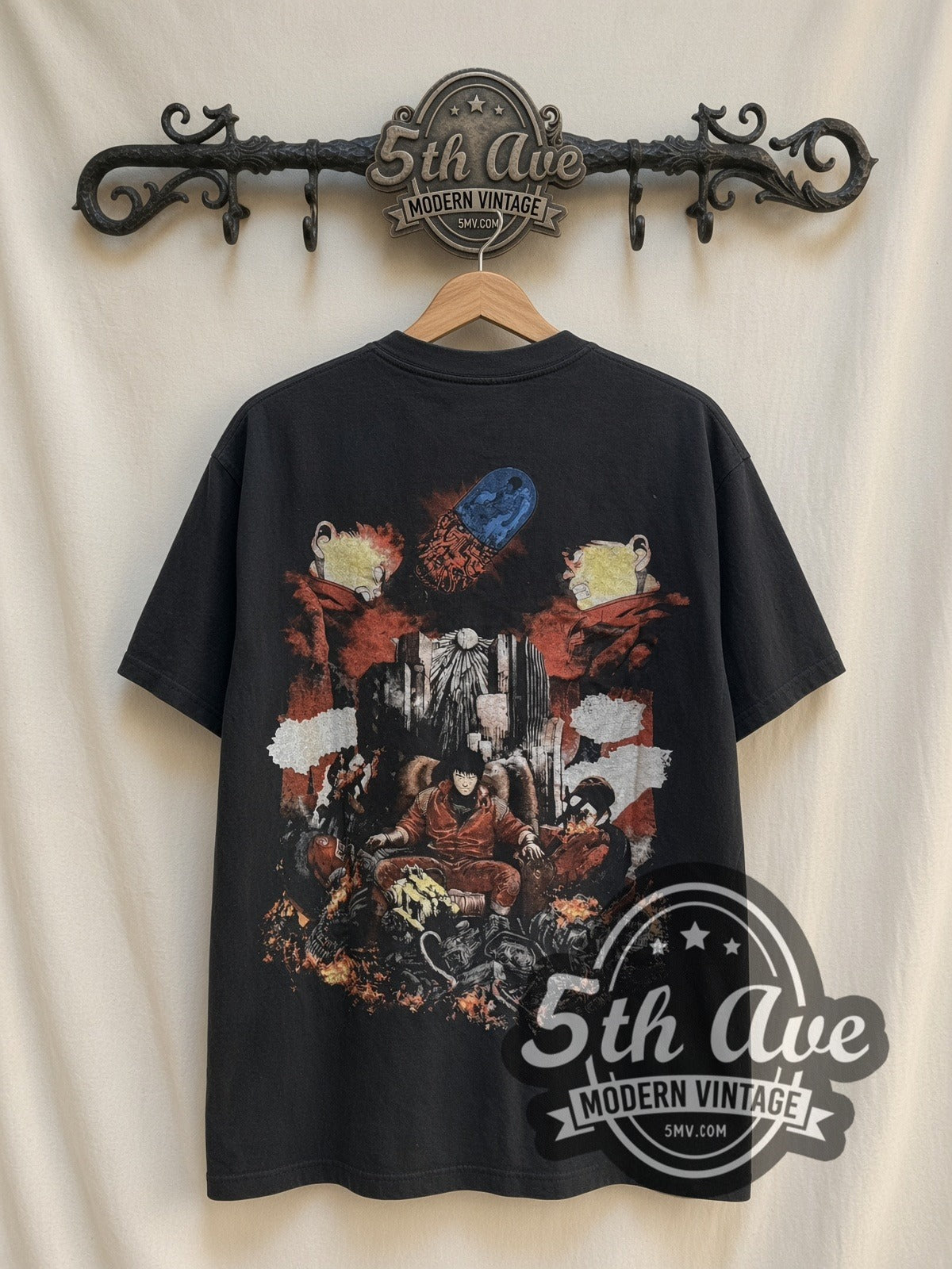 Akira Kaneda Neo Tokyo Is About To Explode vintage graphic t-shirt, back view on a display rack