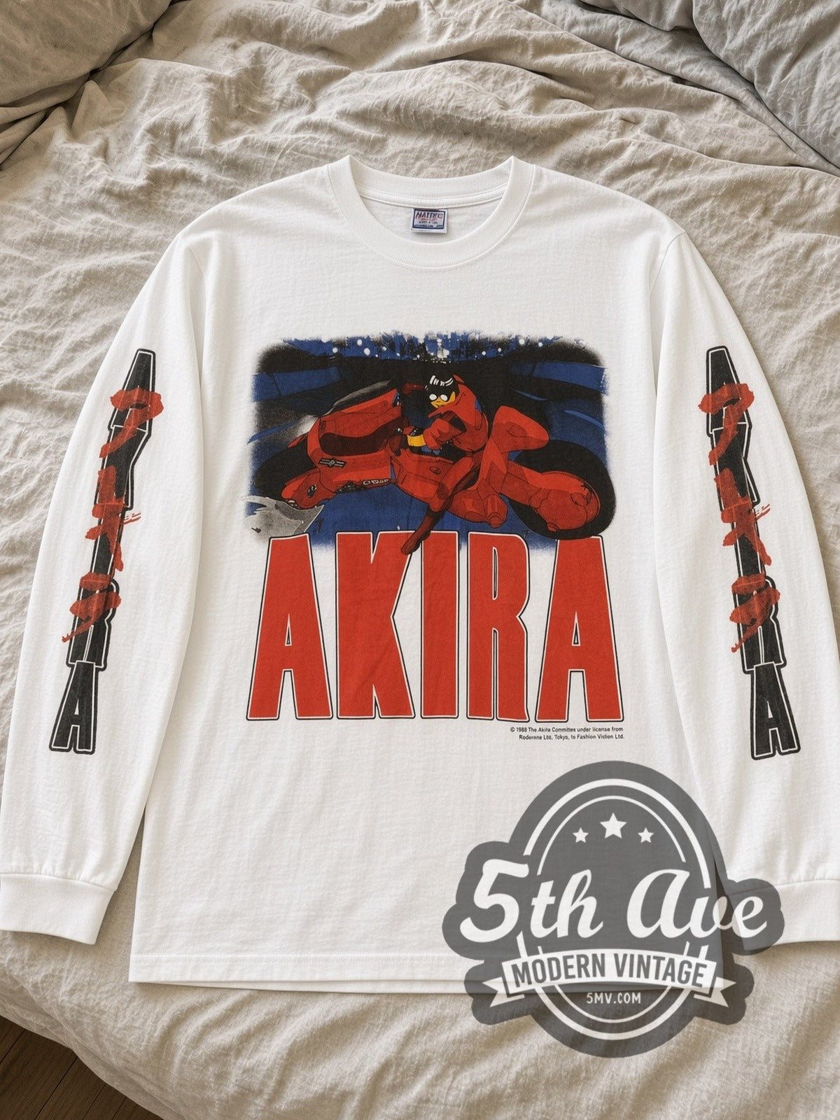 White Akira Kaneda Red Bike & Panel Back long sleeve tee laid flat on linen bed