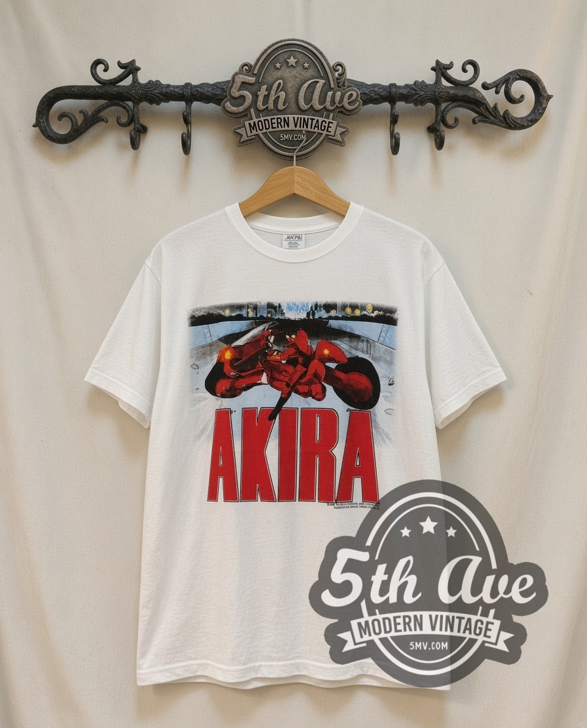 Akira Kaneda Motorcycle Comic Back vintage graphic t-shirt in white, front view on a display rack