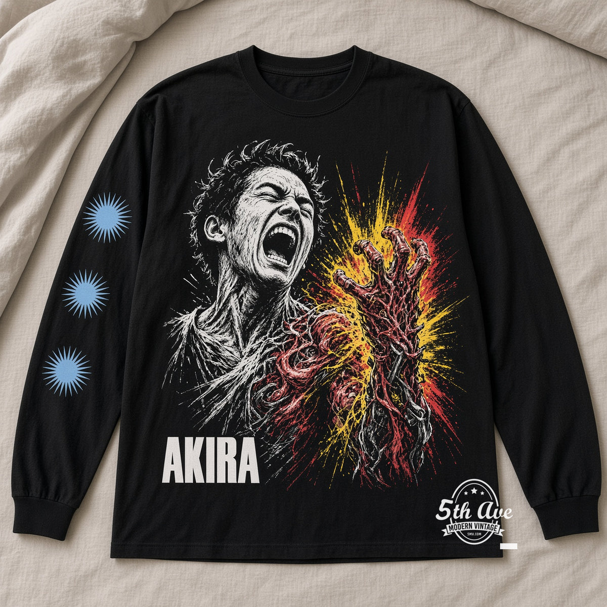 Akira Tetsuo arm Esper sphere vintage t-shirt laid on bed