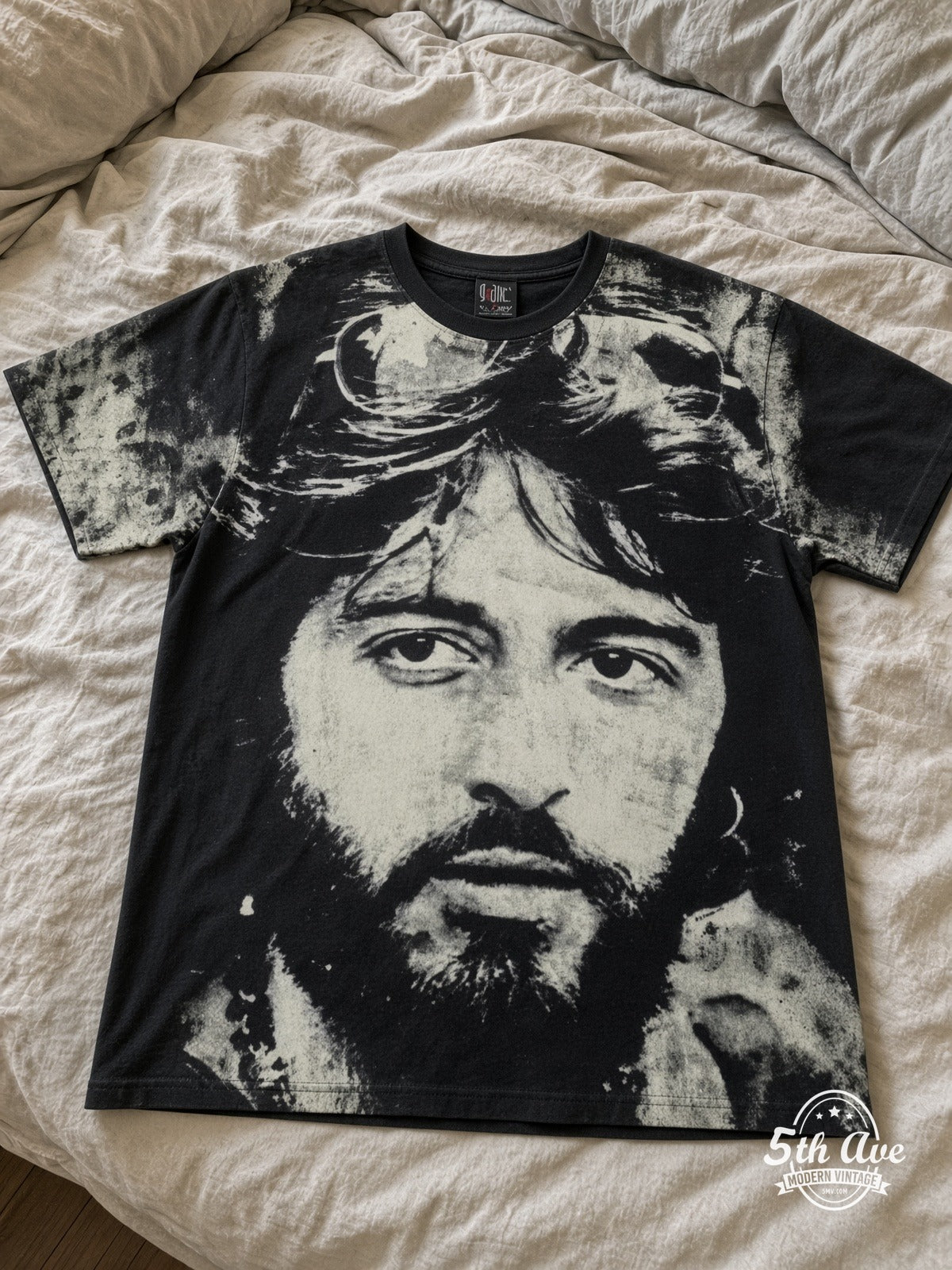 Al Pacino Serpico Sunglasses all over print vintage tee laid on bed