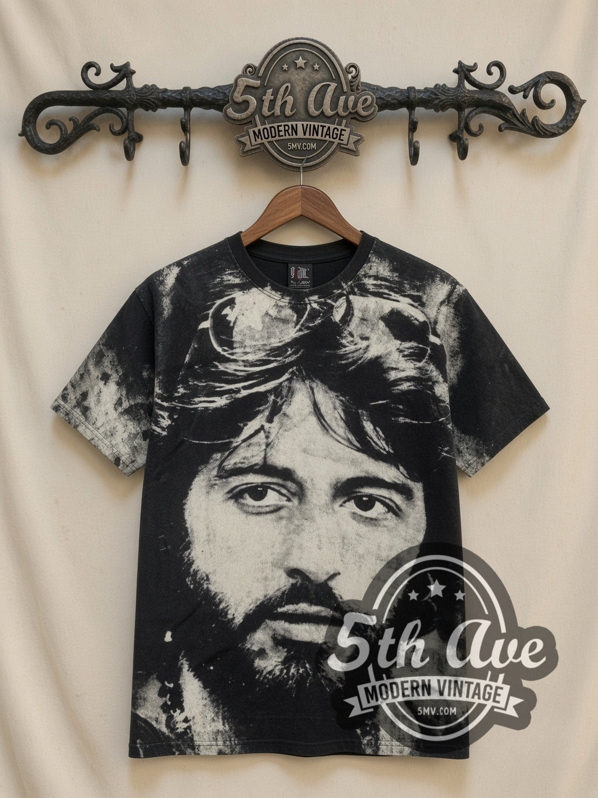 Al Pacino Serpico Sunglasses all-over-print vintage graphic tee in black, front view on a display rack