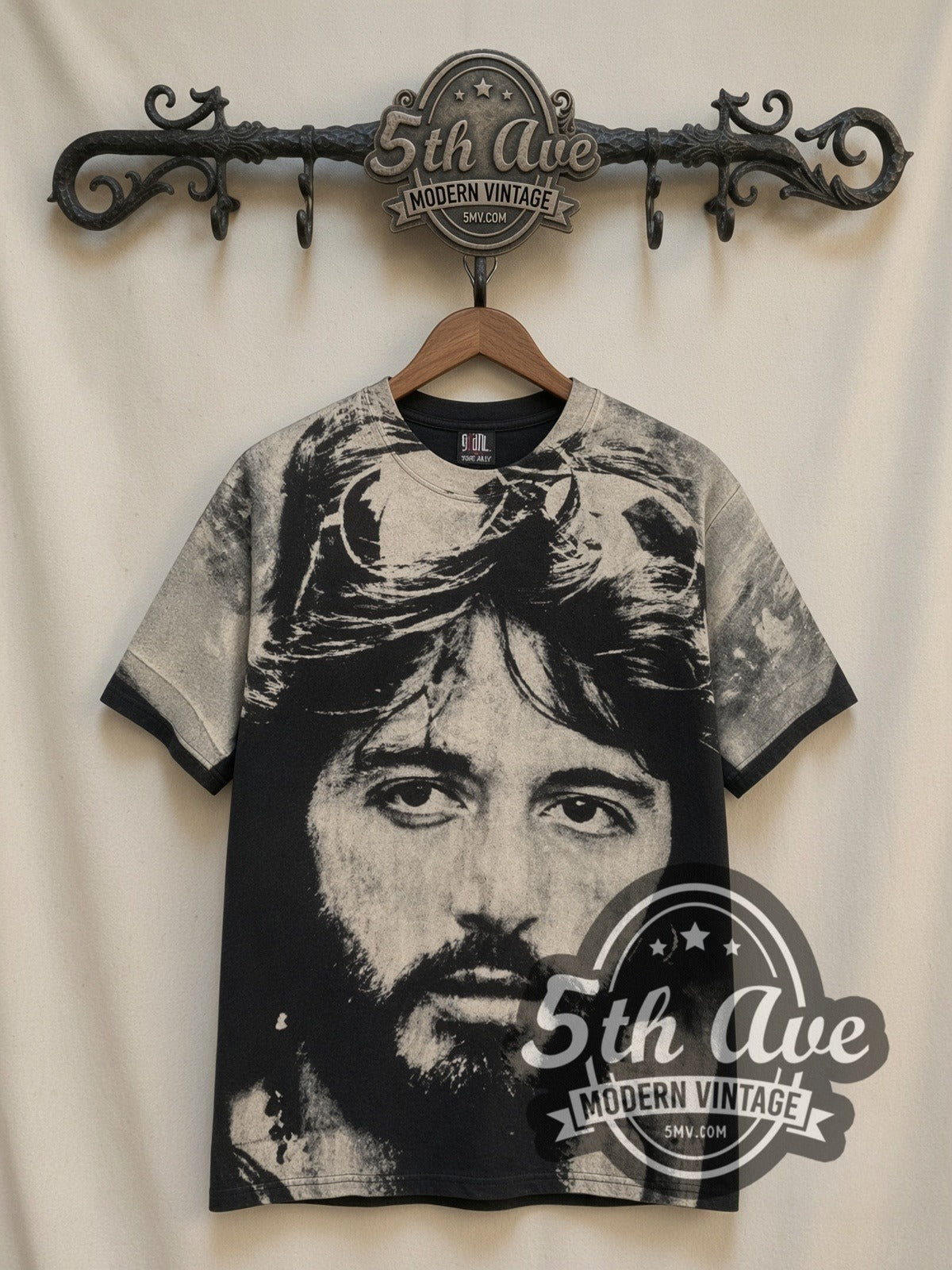 Al Pacino Serpico Sunglasses Variant all-over-print vintage graphic tee, front view on a display rack