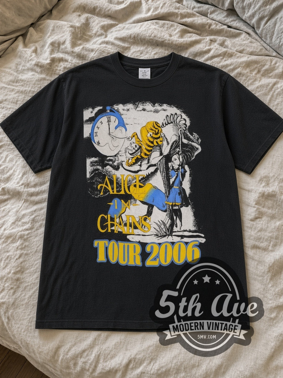 Black Alice in Chains Fall Tour 2006 Vintage Band T-Shirt laid flat on a linen bed
