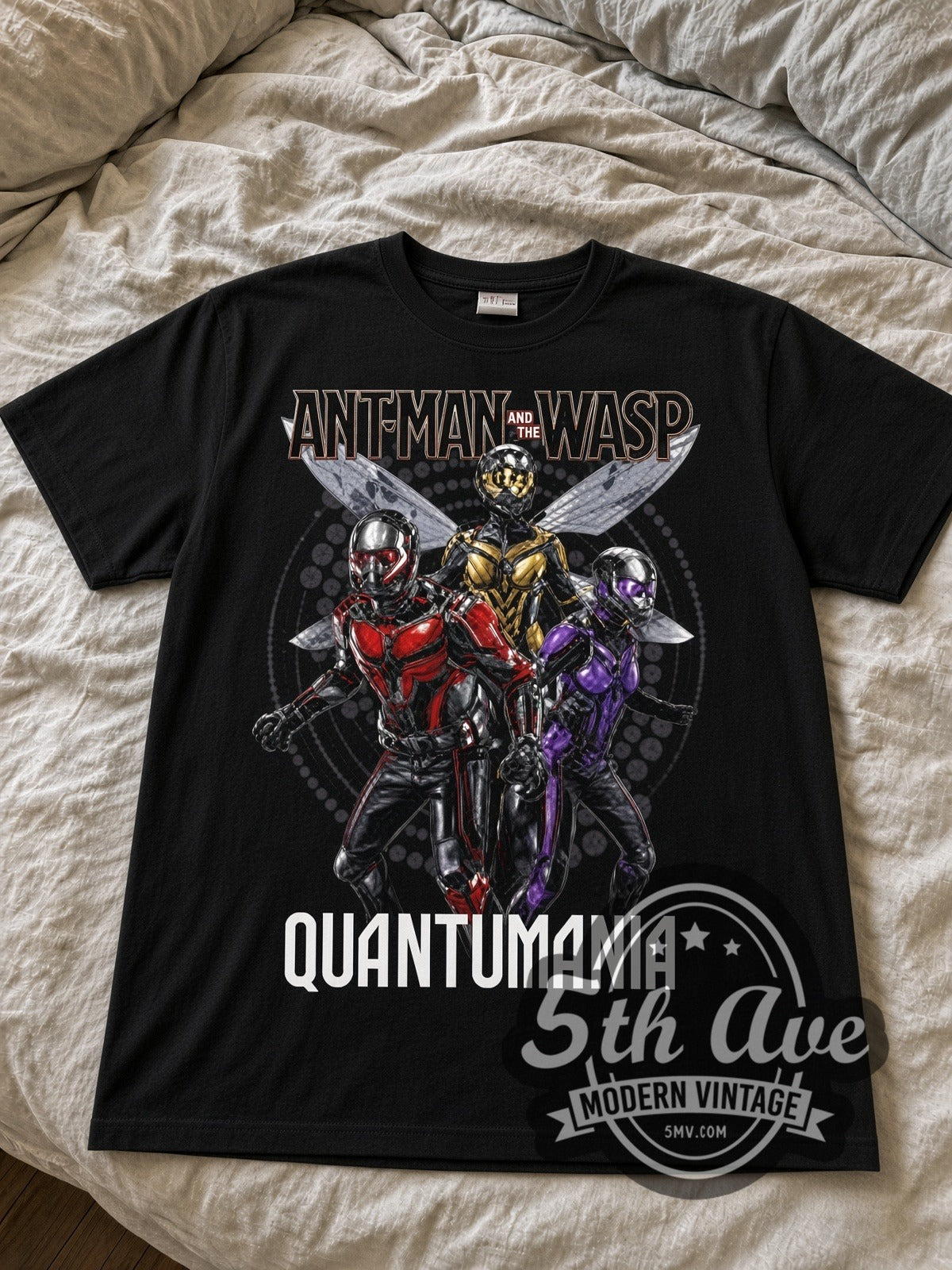 Ant-Man Quantumania black graphic tee laid flat on linen bed