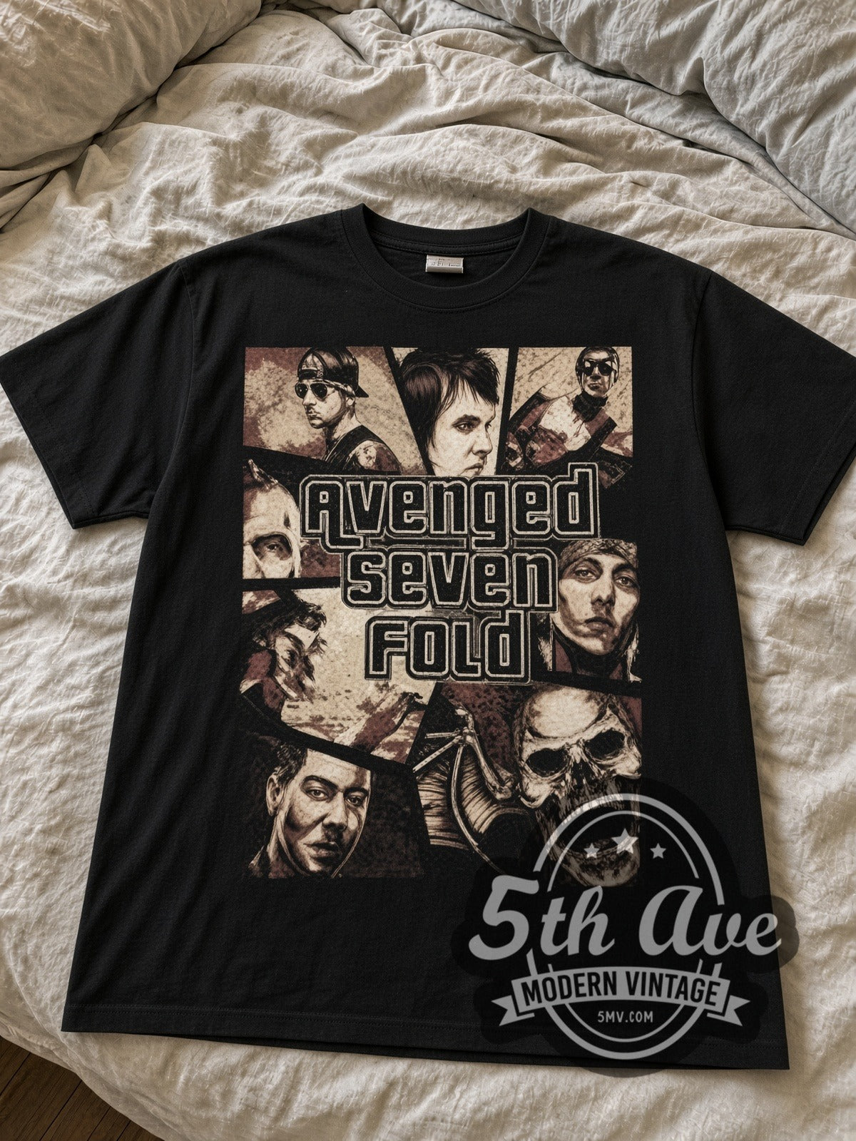 Avenged Sevenfold Comic Panel Collage black graphic tee laid flat on linen bed