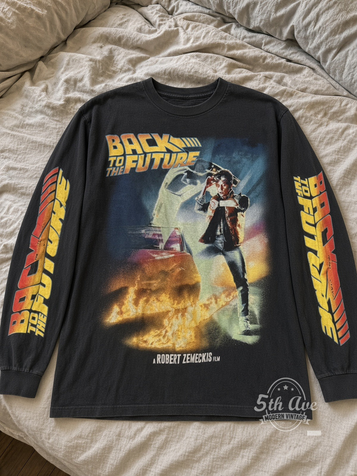 Back to the Future Where We're Going Poster Long Sleeve vintage movie tee laid flat on bed