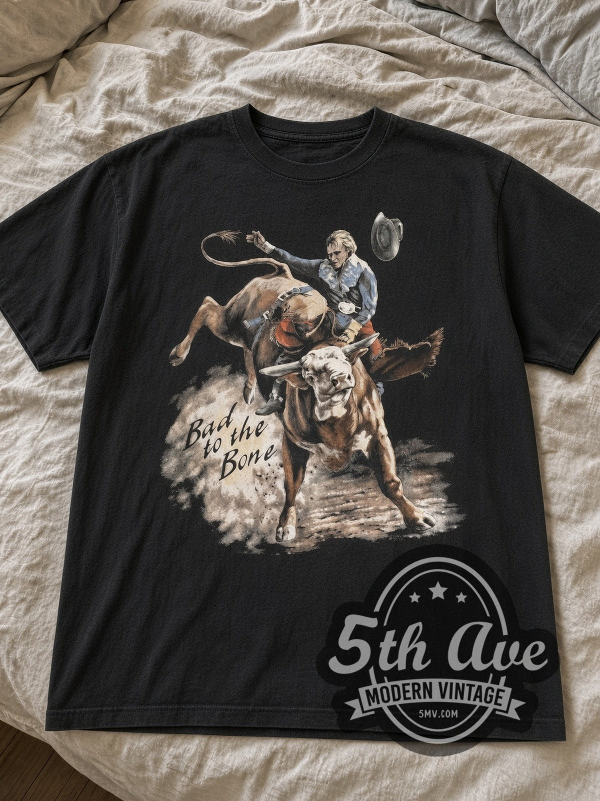 Black Bad to the Bone Bull Rider & Truckers World Eagle tee laid flat on linen bed