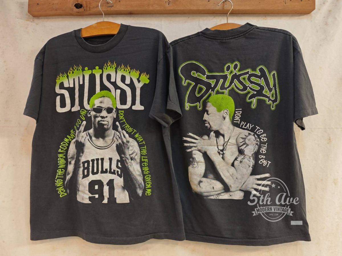 Dennis Rodman x Stüssy vintage band t-shirt front and back on hangers