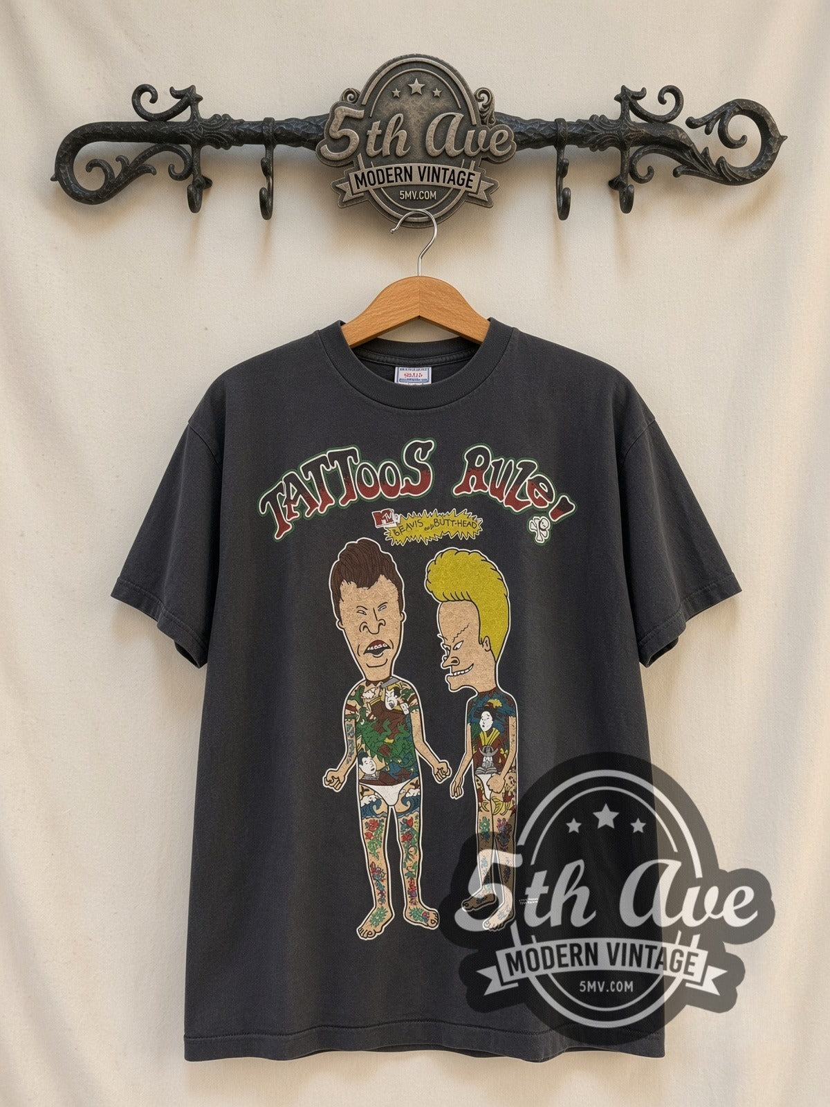 Beavis and Butt-Head Tattoos Rule vintage cartoon t-shirt, front view on a display rack