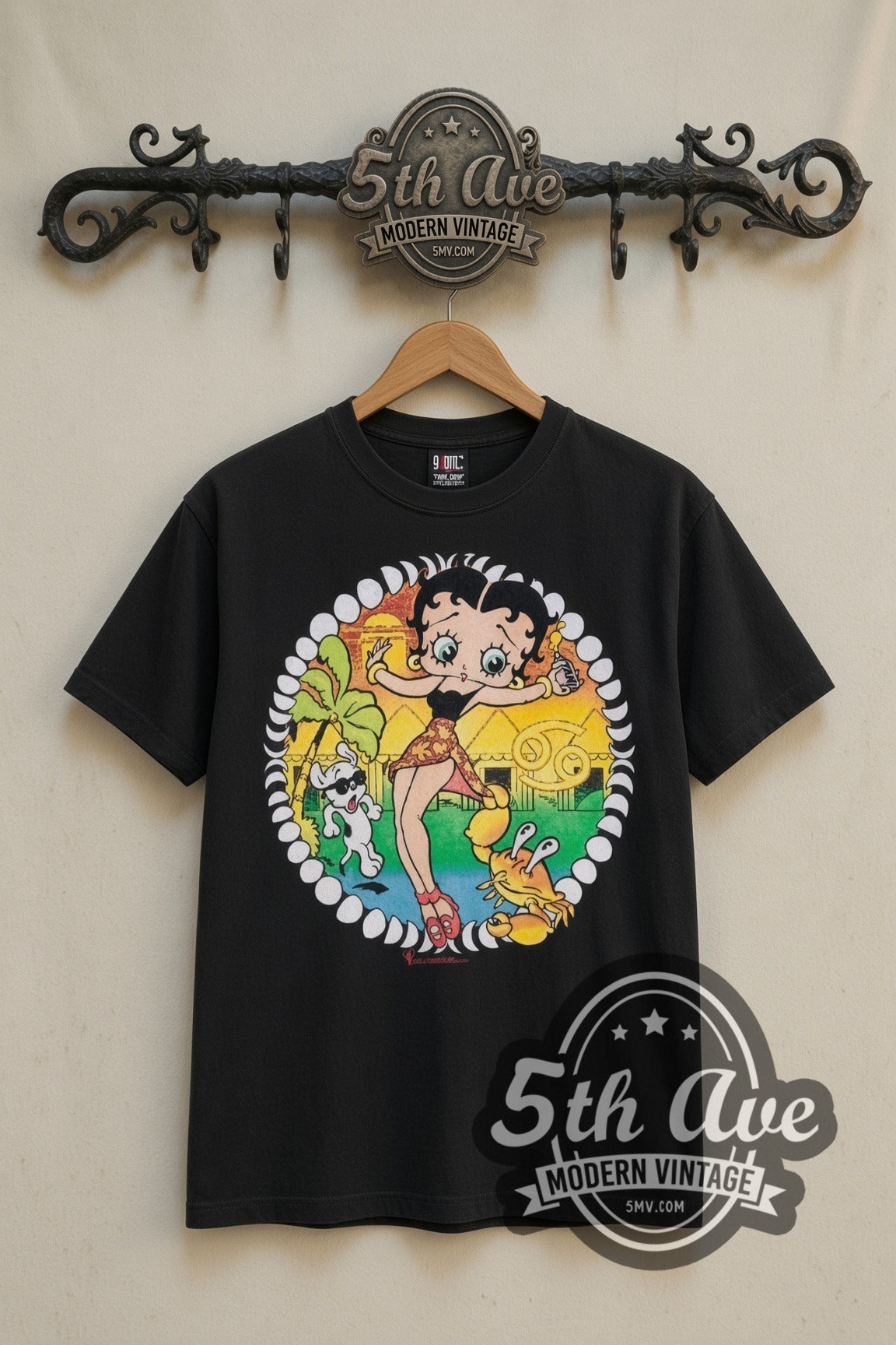 Betty Boop Beach Crab Floral Circle cartoon tee in black, front view on a display rack