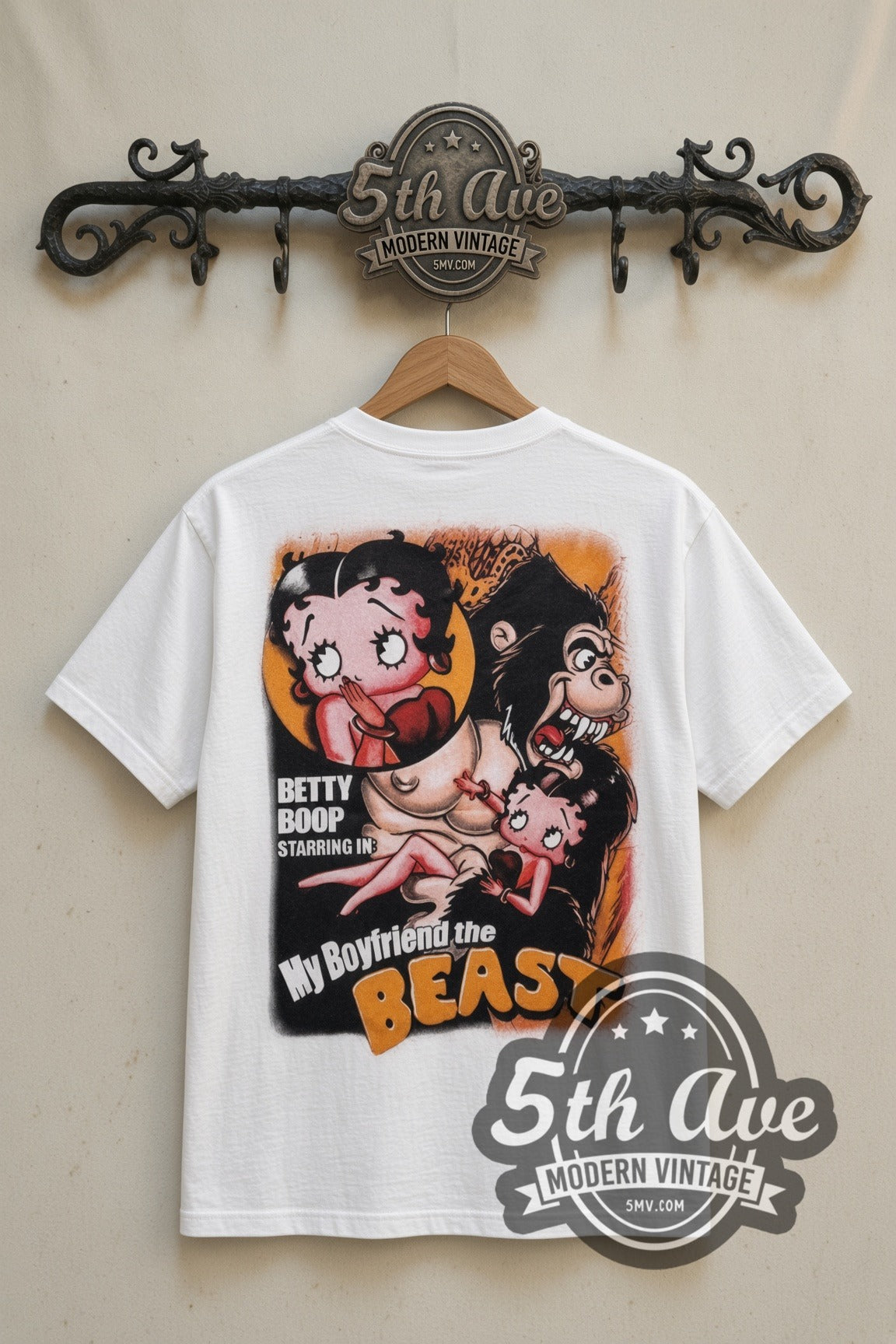 Betty Boop Betty and the Beast cartoon tee in white, back view on a display rack