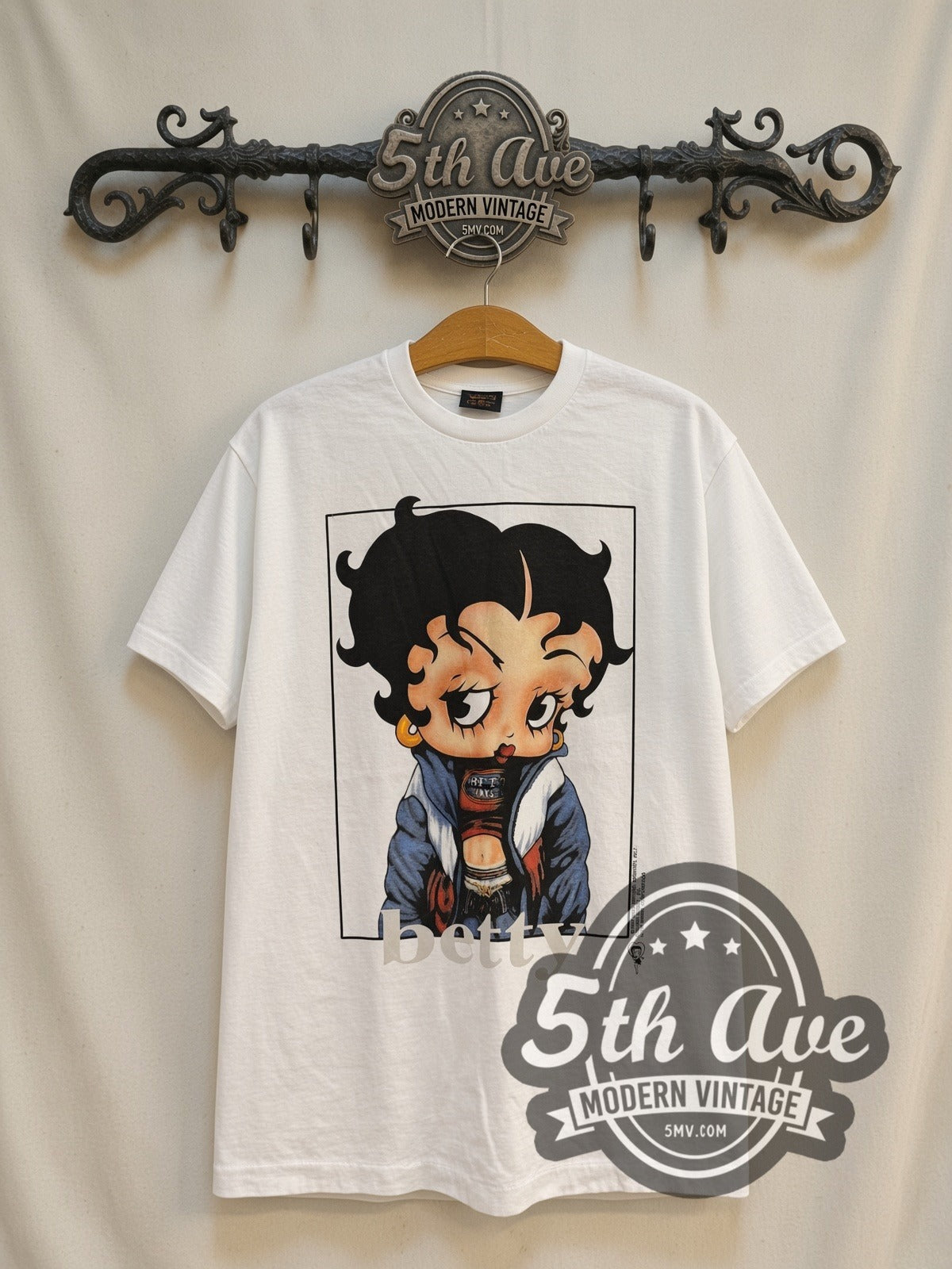 Betty Boop Blue Puffer Jacket vintage cartoon t-shirt, front view on a display rack