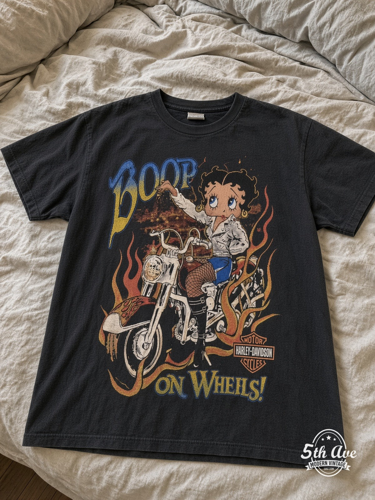 Betty Boop Boop On Wheels Harley-Davidson vintage tee laid on bed
