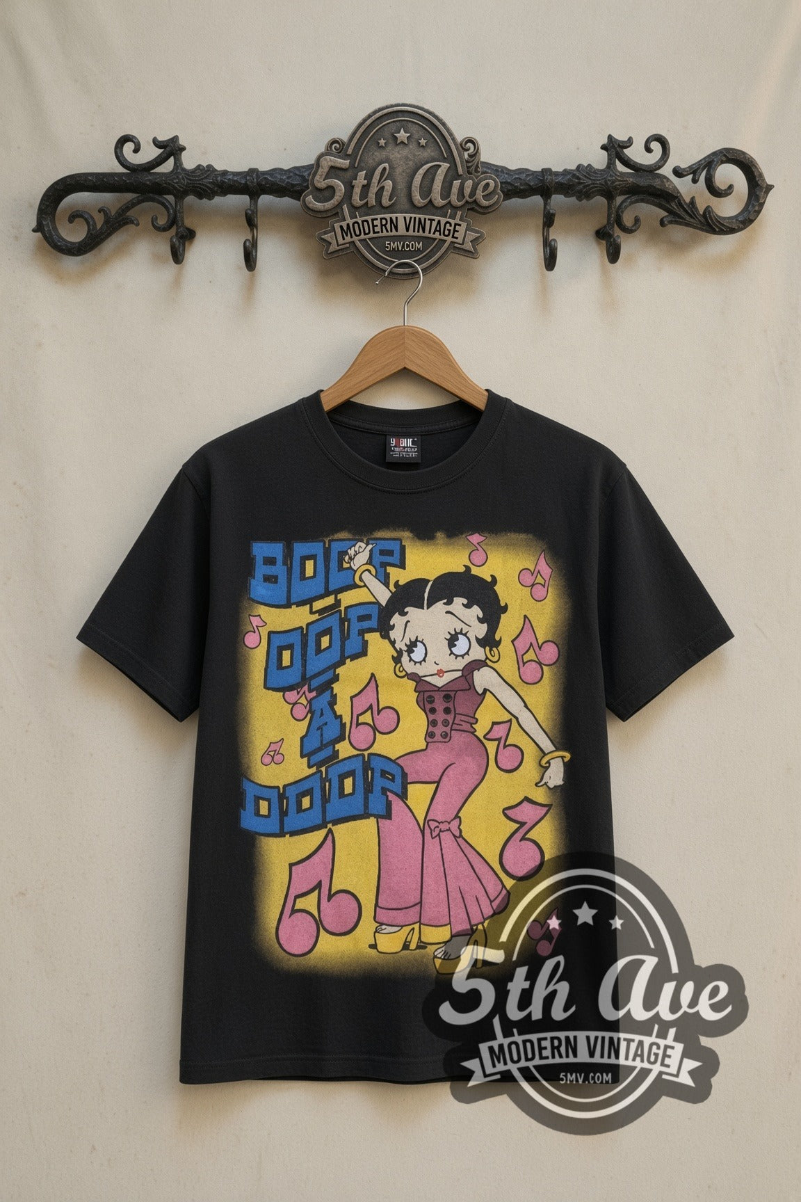Betty Boop Boop Oop A Doop Music is Life cartoon tee in black, front view on a display rack
