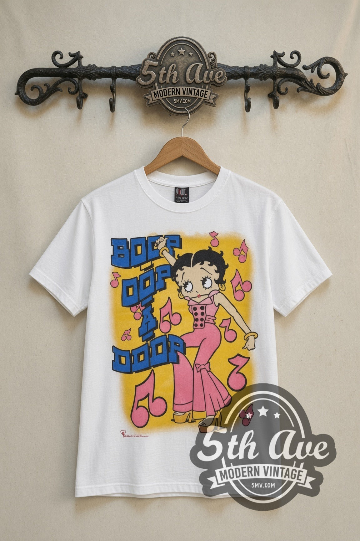Betty Boop Boop Oop A Doop Music is Life cartoon tee in white, front view on a display rack