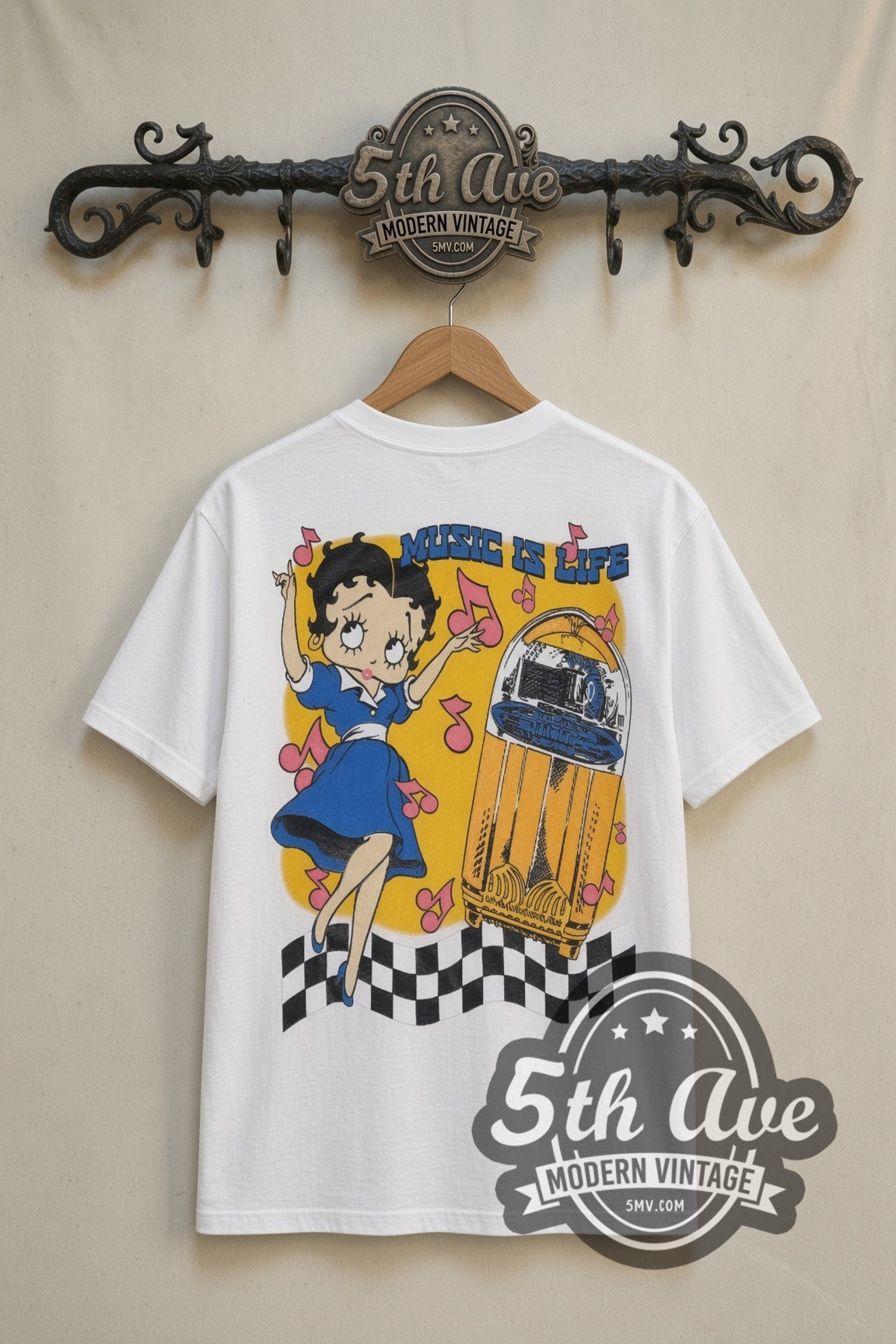 Betty Boop Boop Oop A Doop Music is Life cartoon tee in white, back view on a display rack