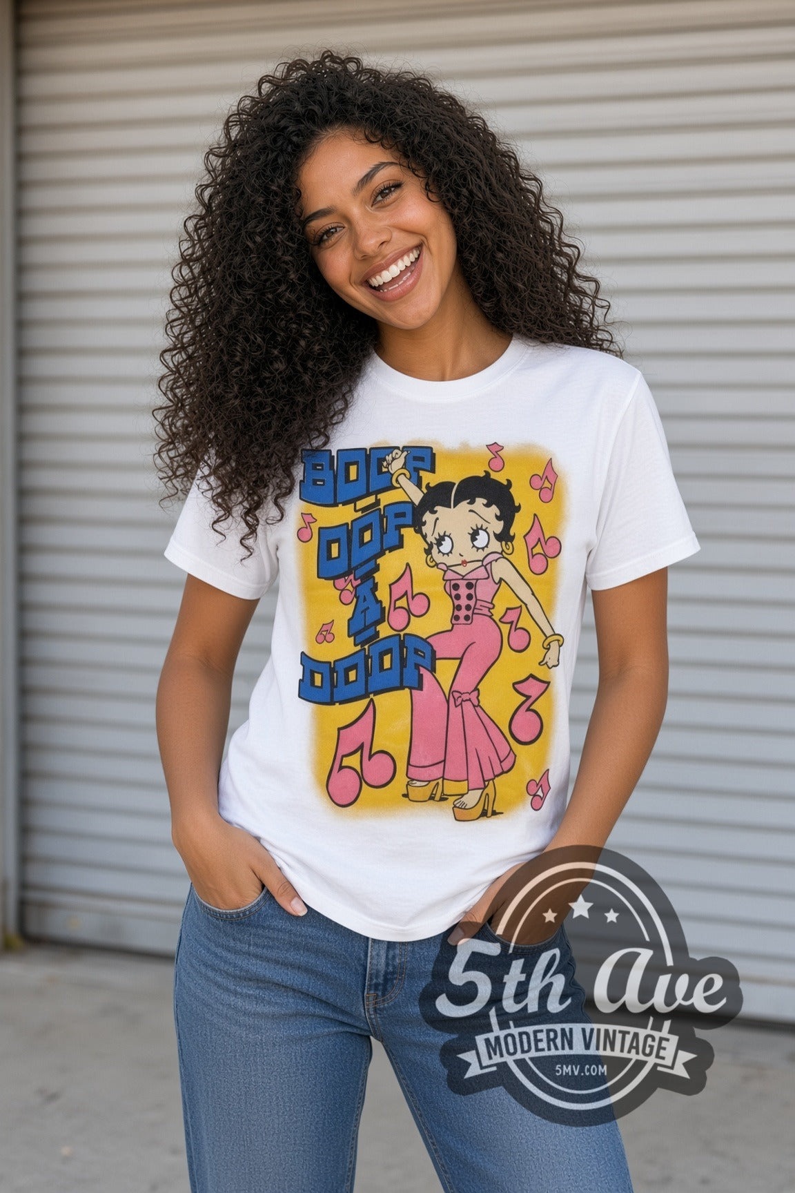 Model wearing the Betty Boop Boop Oop A Doop Music is Life cartoon tee in white