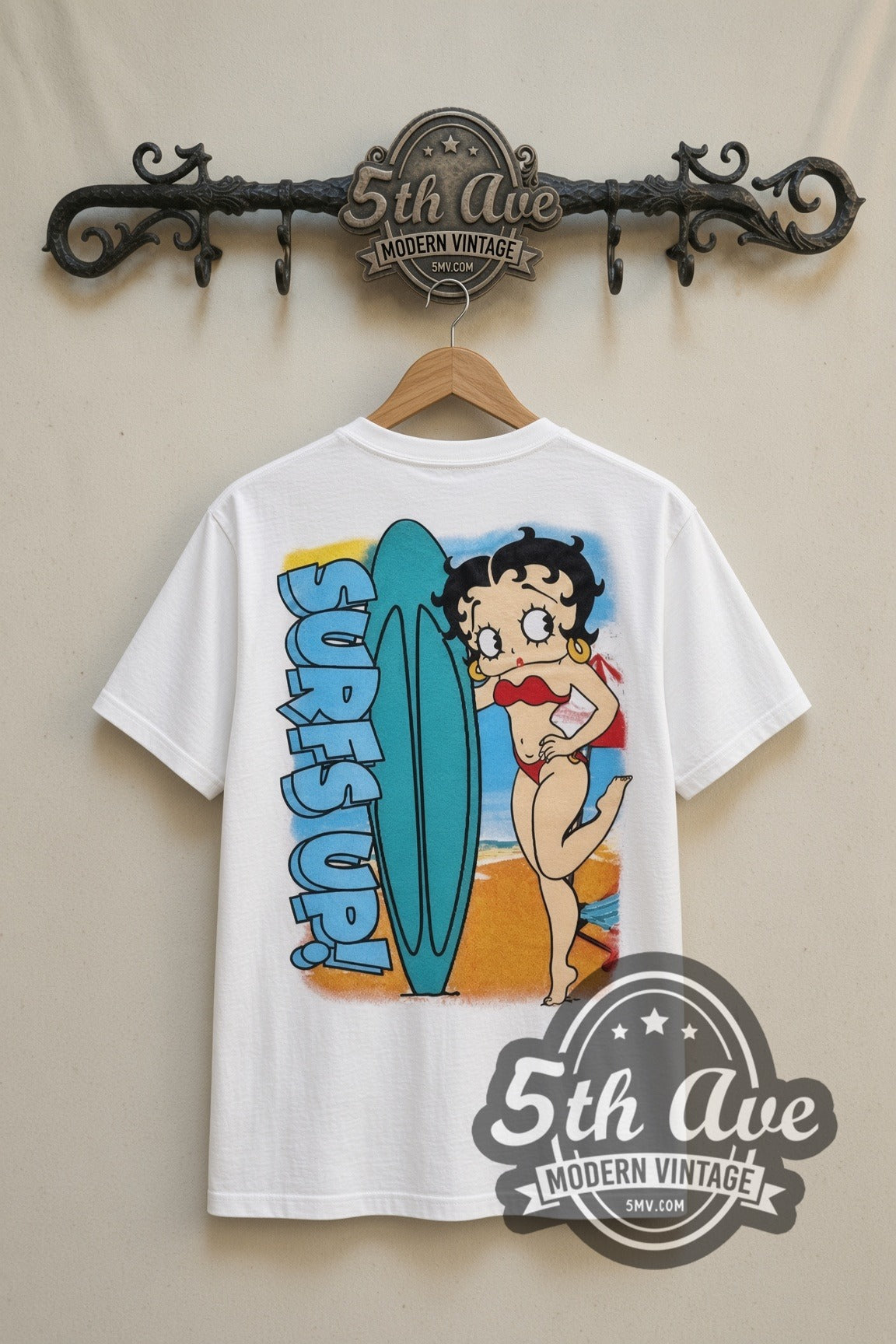 Betty Boop Boop Surf Aloha Friday cartoon tee in white, back view on a display rack