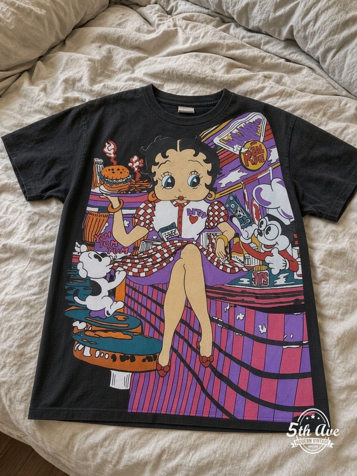 Betty Boop Betty Boop Checkered Dress Abstract vintage tee laid on bed