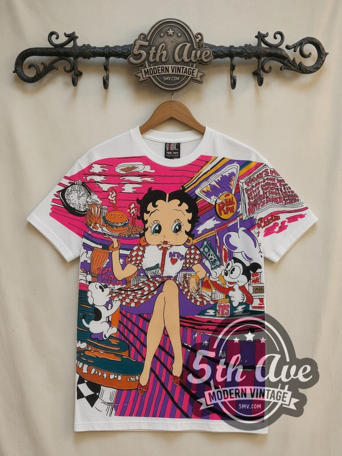 Betty Boop Checkered Dress Abstract all-over-print vintage cartoon t-shirt in white, front view on a display rack