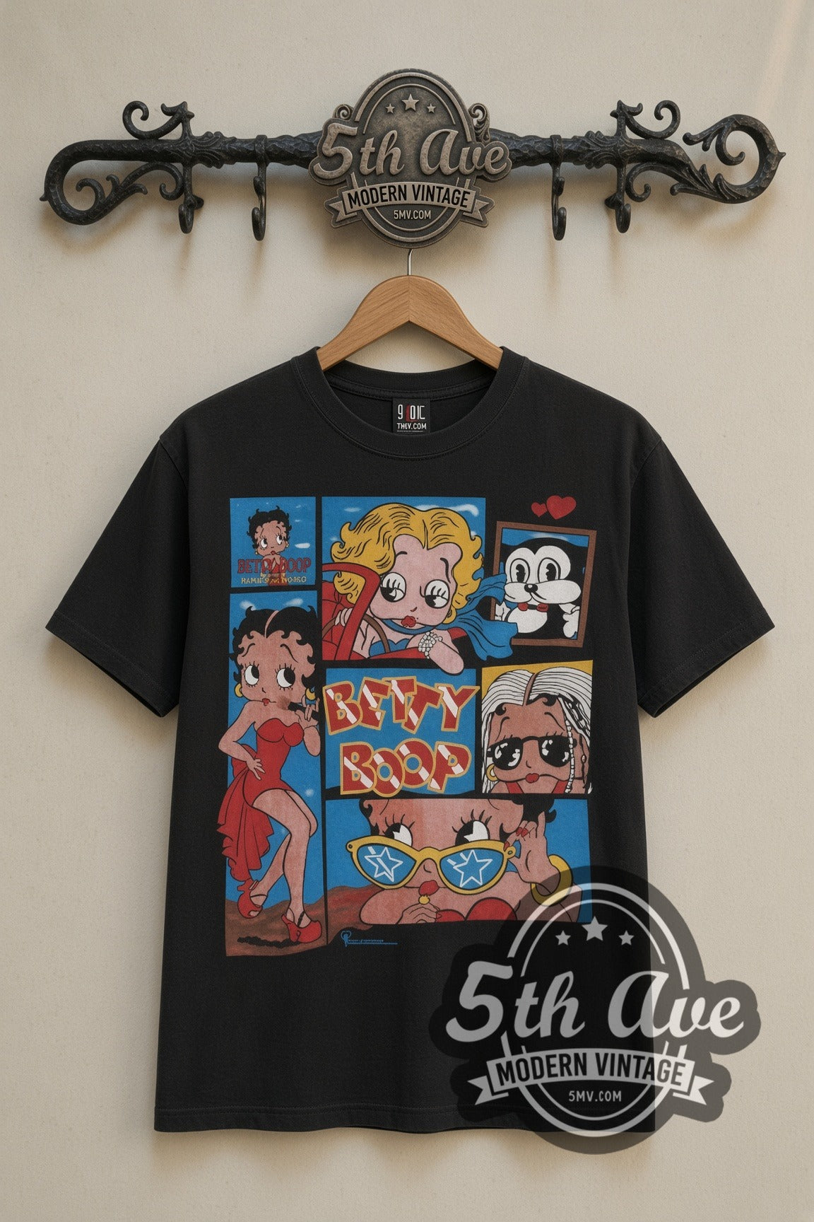 Betty Boop Comic Collage cartoon tee in black, front view on a display rack