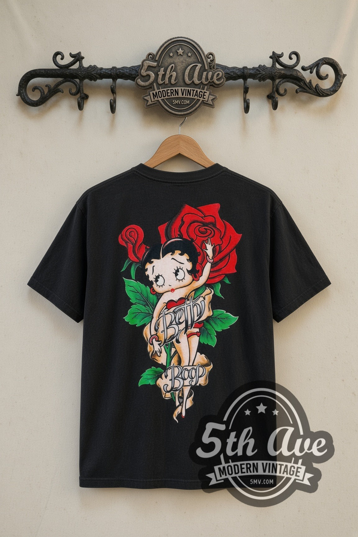 Betty Boop Cutie Tattoo Roses cartoon tee in black, back view on a display rack