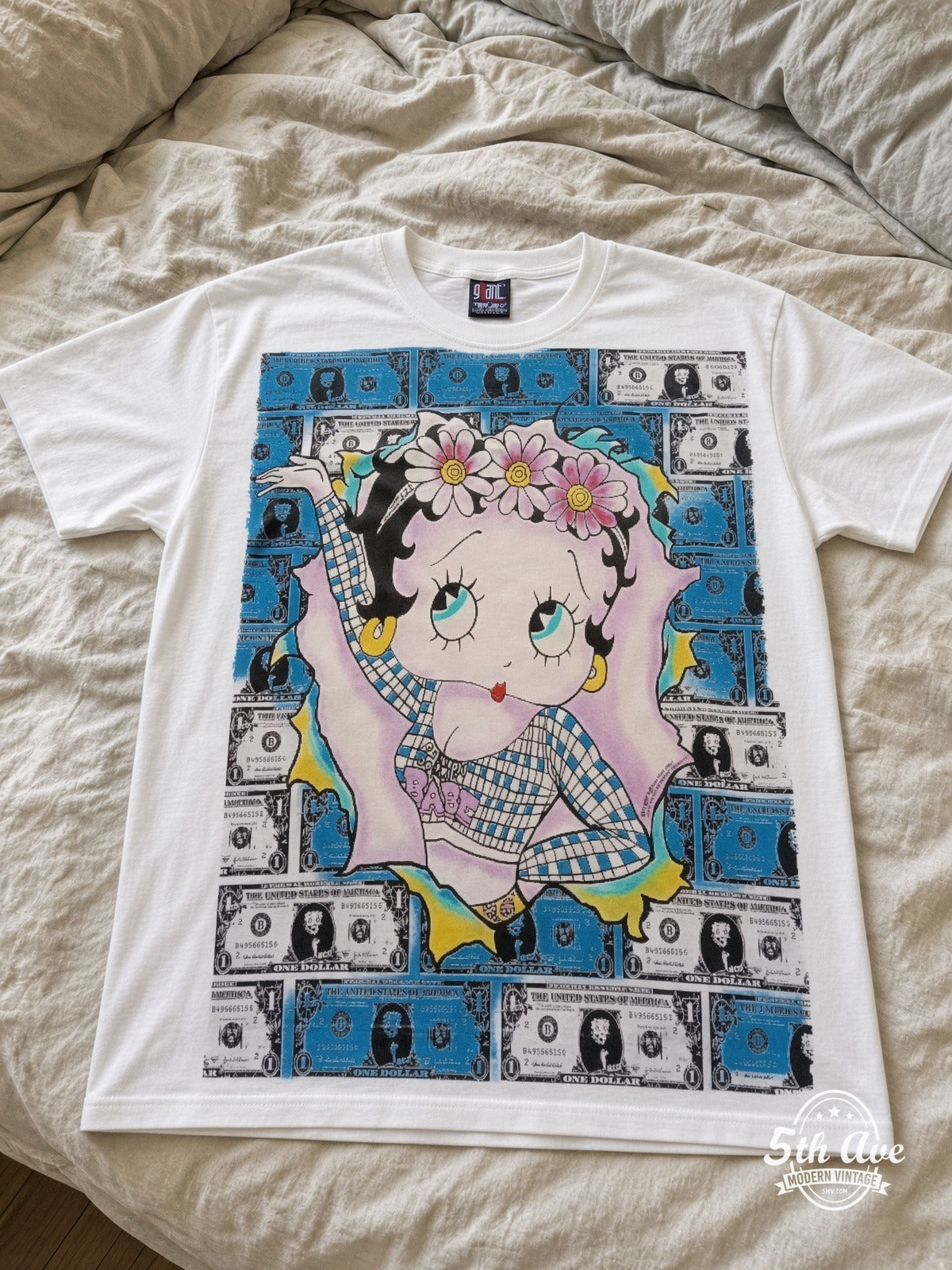 Betty Boop Betty Boop Hundred Dollar Bills vintage tee laid on bed