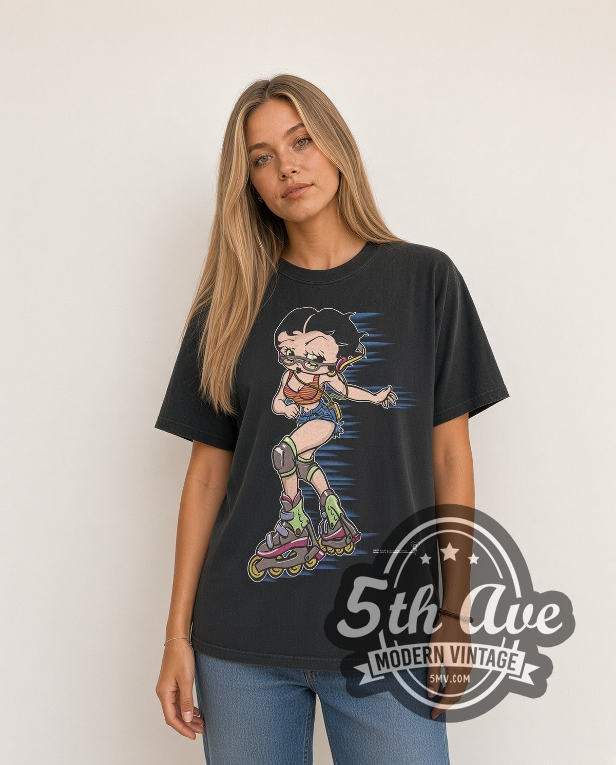 Woman wearing Betty Boop rollerblading vintage graphic tee