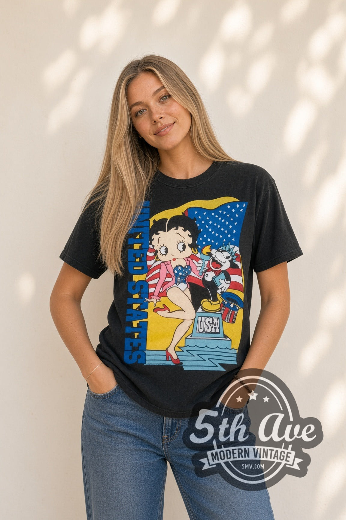 Model wearing the Betty Boop USA Statue of Liberty cartoon tee in black